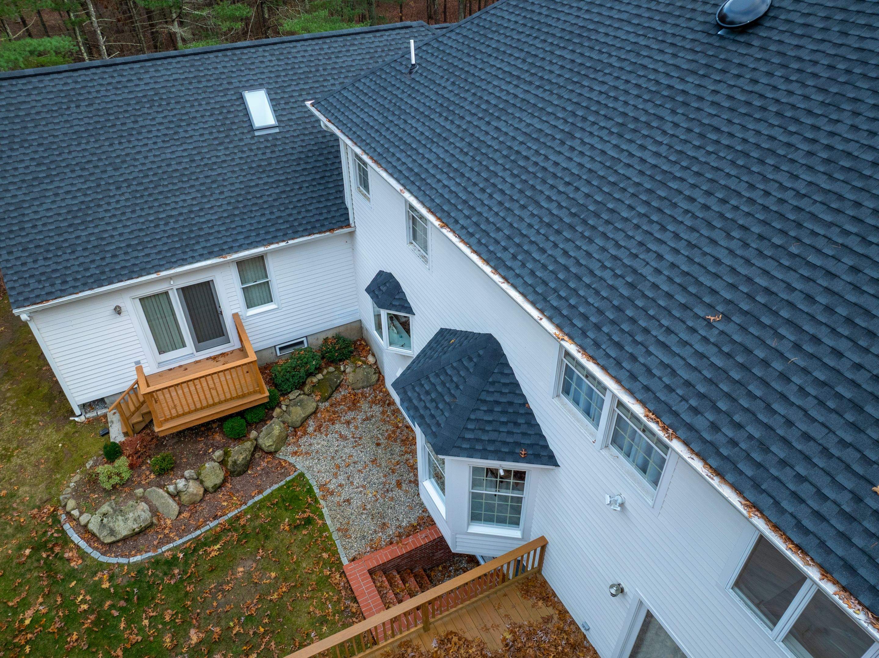 High Hawk - Architectural Shingles, Copper Brick Flashing, Skylights by Rinaldi Brothers