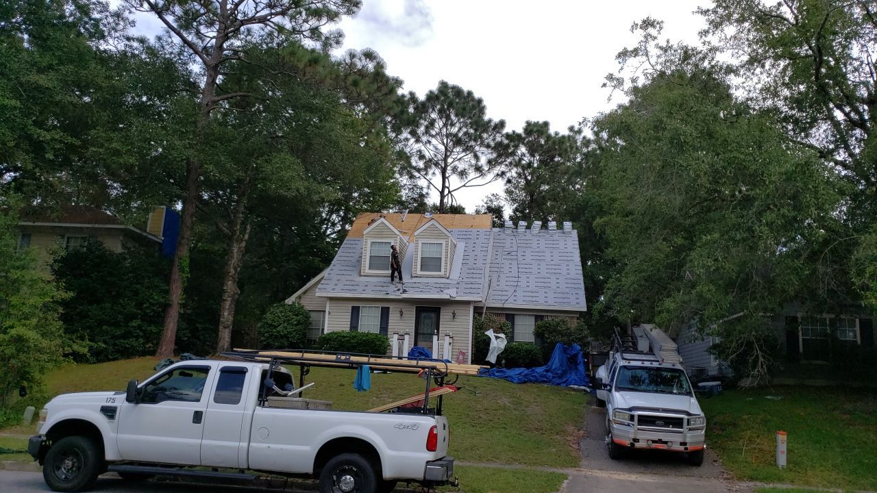 Residential Roofing Installation using Roof Replacement by American Roofing & Construction LLC