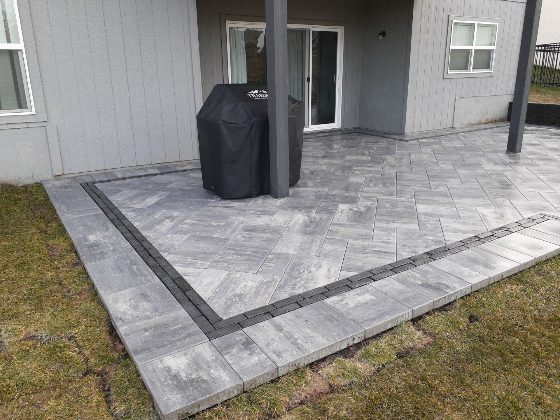 Back Yard Paver Patio by LAND ESCAPES LLC