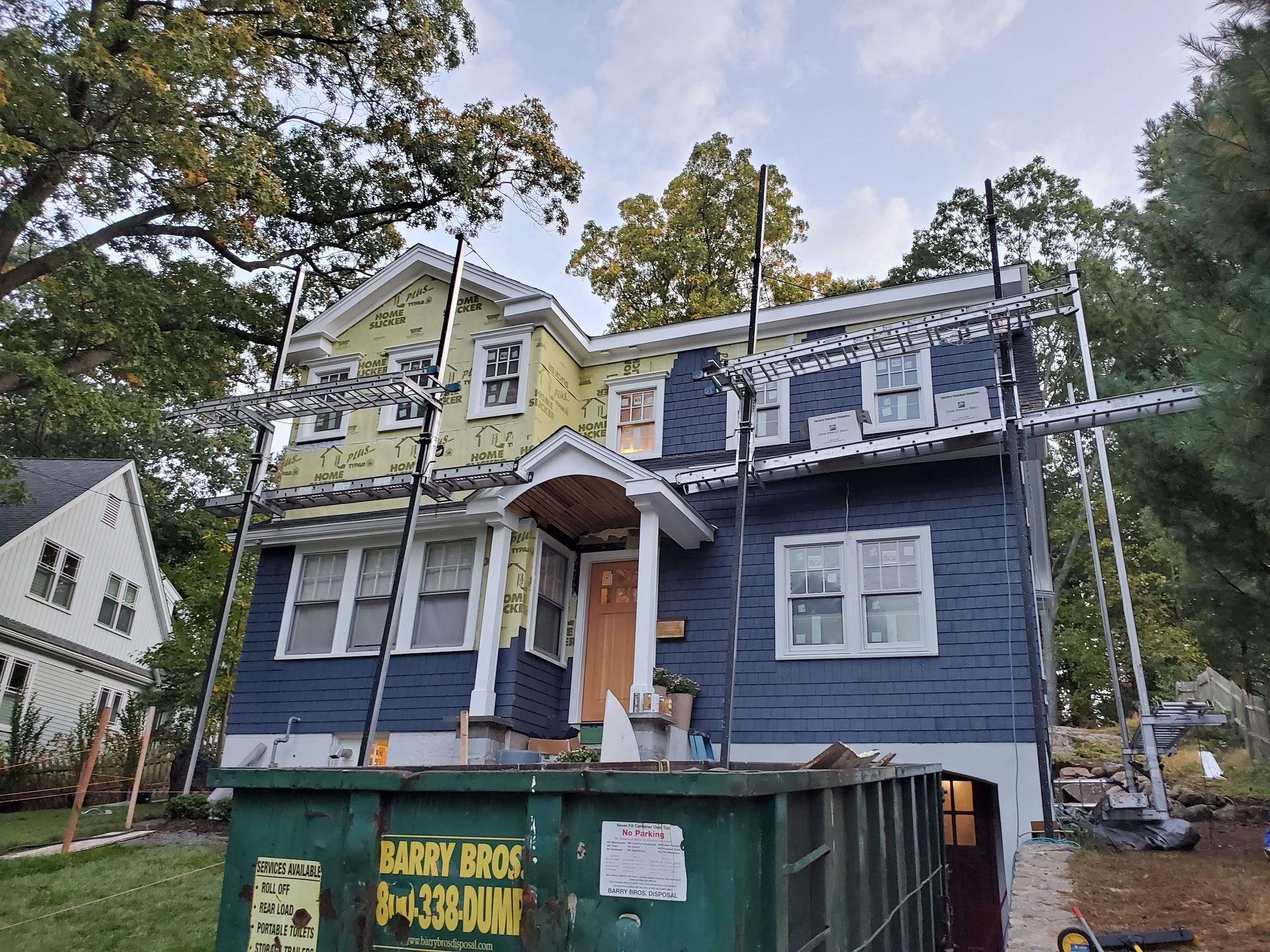 Siding Installation using Red Cedar by UBrothers Construction