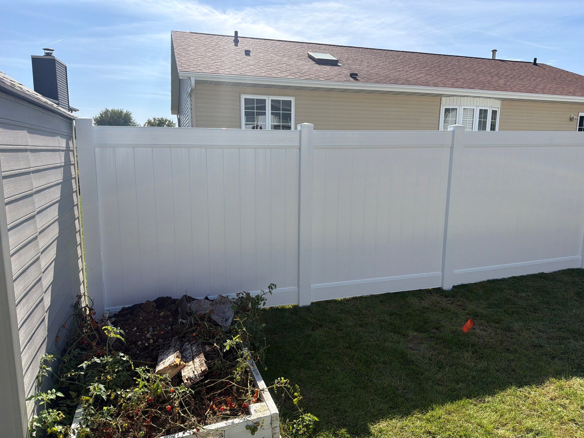 Custom Vinyl Privacy and Chain Link Fence Installation in Waterloo by Perfect Picket Fence and Stain