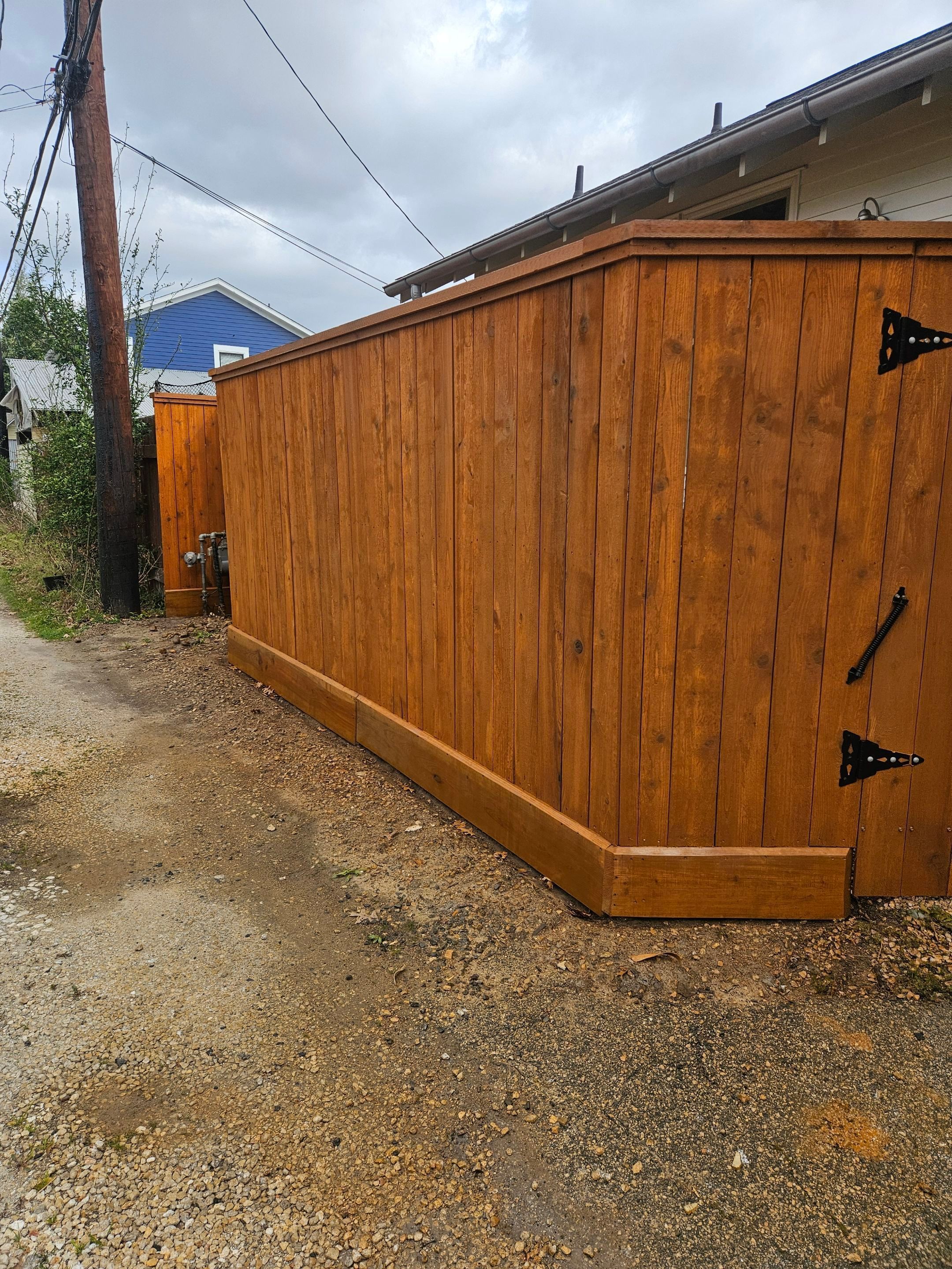 Durable Fence & Gate Installation with Premium Stain by Tim's Fences