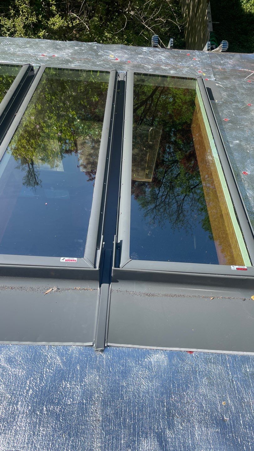 Roof Replacement w/ Skylights in Baltimore, MD (IKO Dynasty) by American Home Contractors