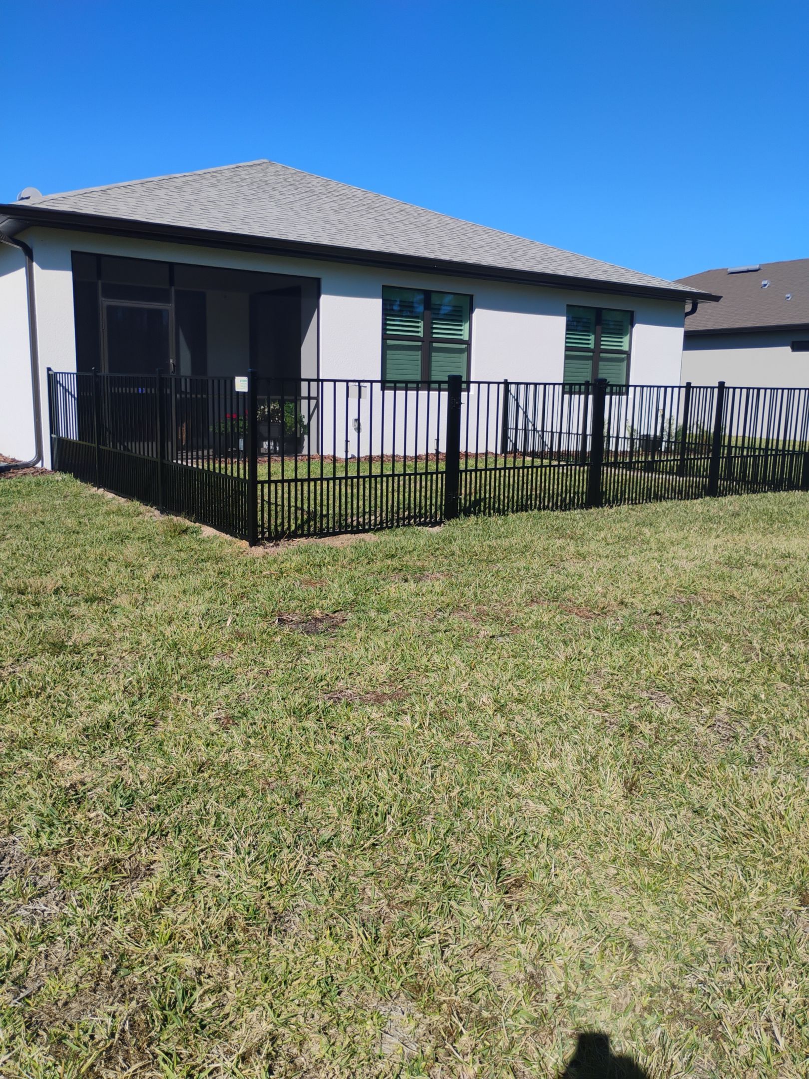 Puppy picket aluminum fence in North Port by True Fence LLC