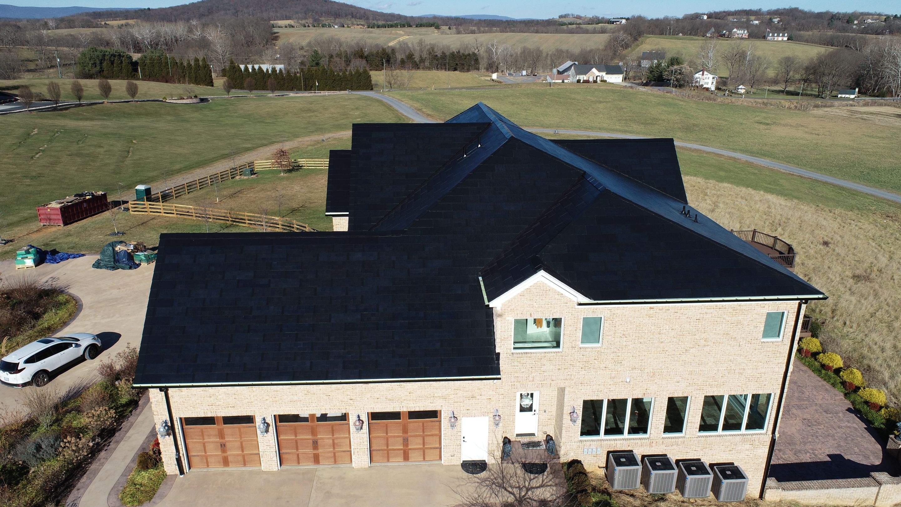 Tesla Solar Roof Replacement  by American Home Contractors