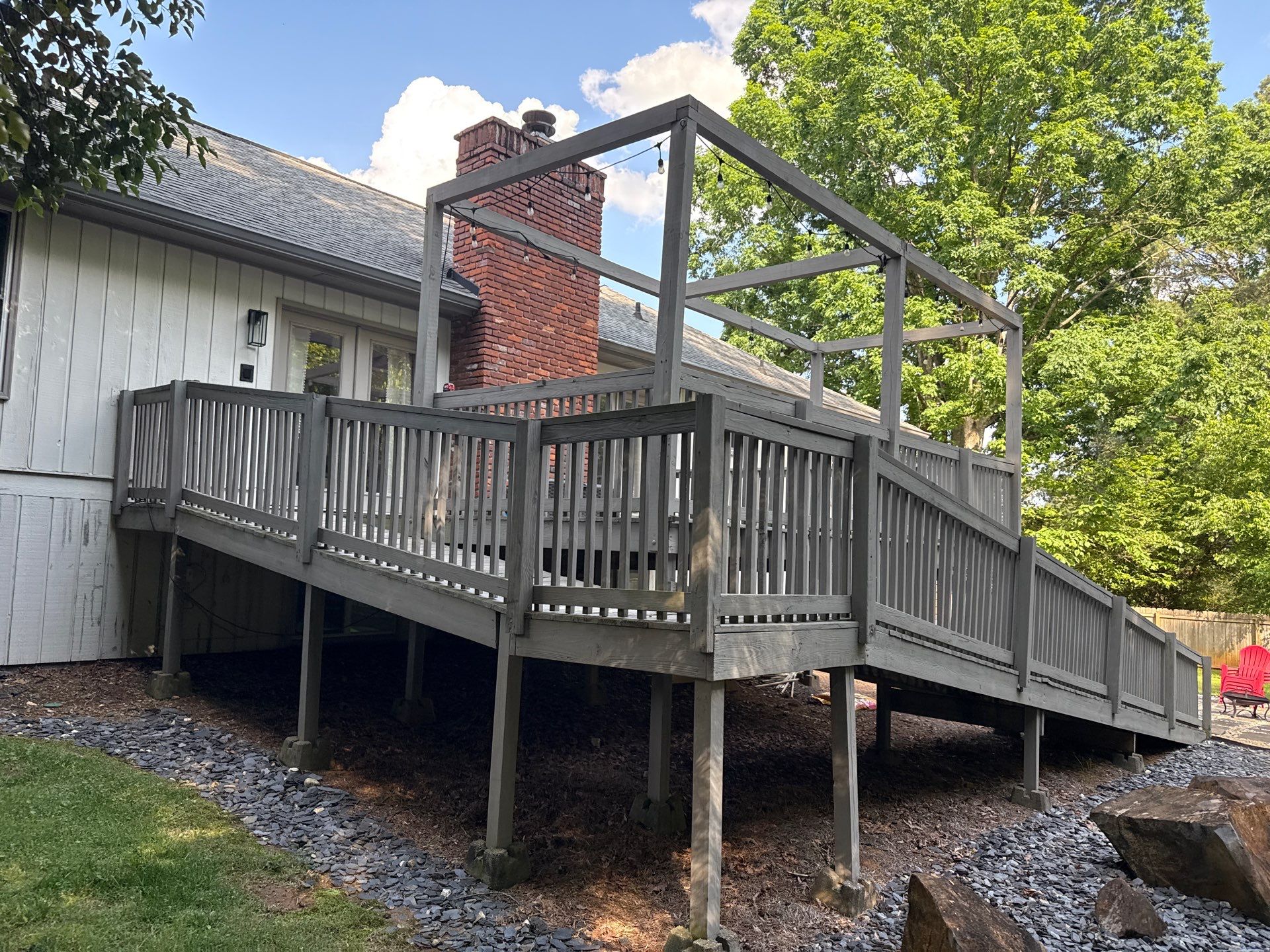 Deck and Shed Roof Style Covered Build using Trex Decking Products by Nelson Exteriors 