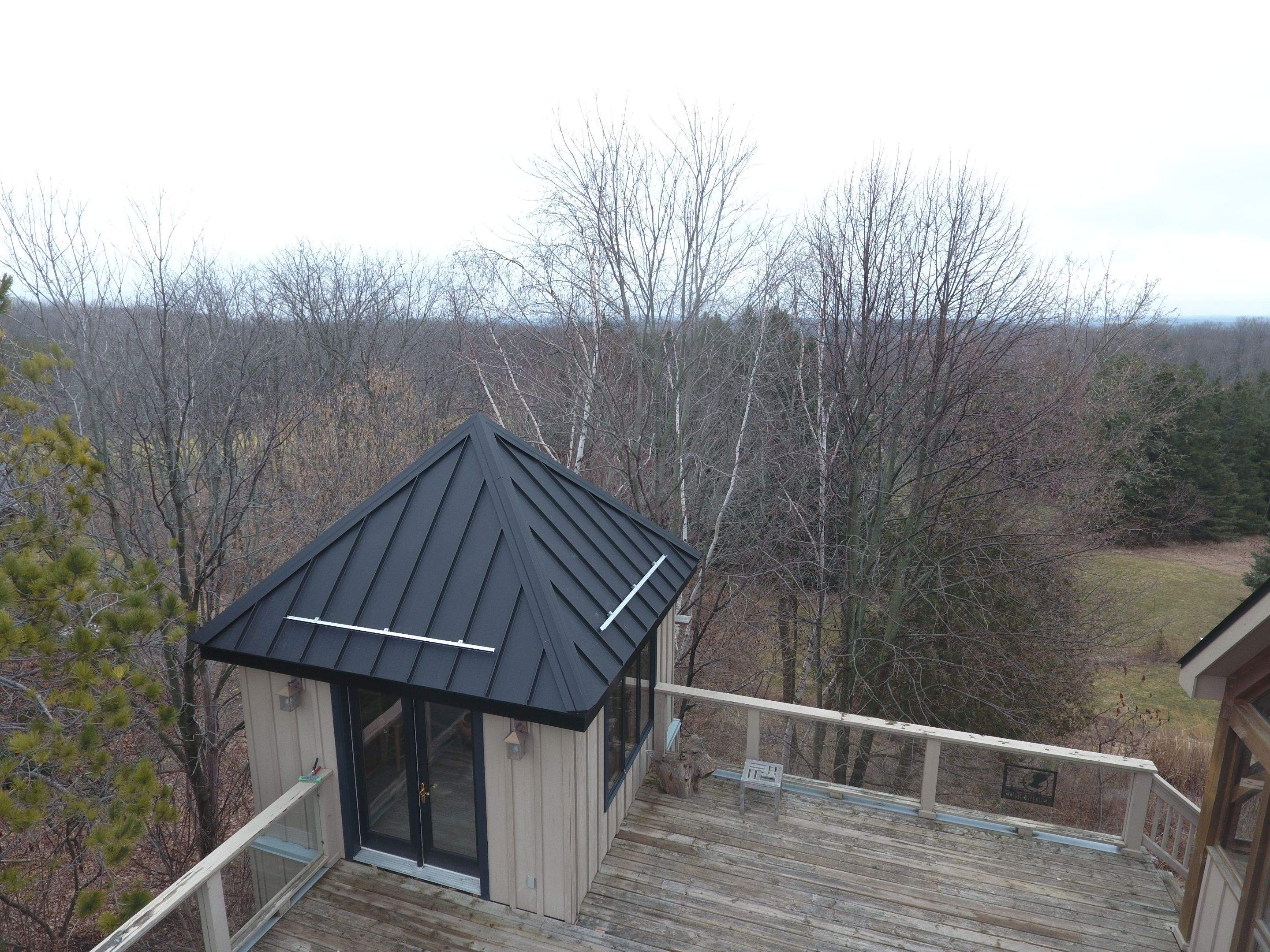Residential Roofing Installation using 24 Ga Standing Seam Metal by Jay Carter Roofing & Sheet Metal