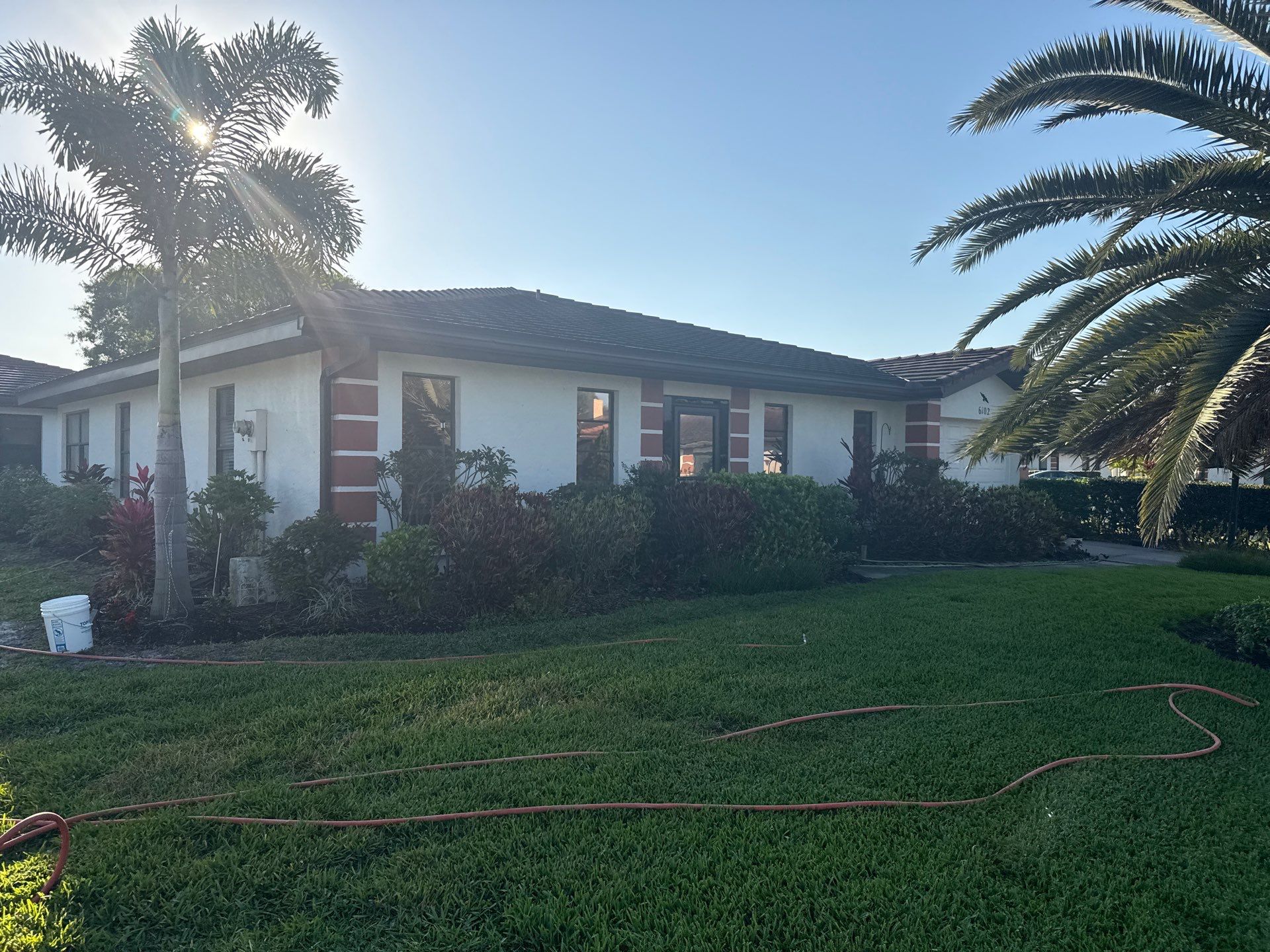 Tile Roof Cleaning – Vivenda at Bradenton I (5-Star Review & Plant Protection) by Sunshine AquaWash