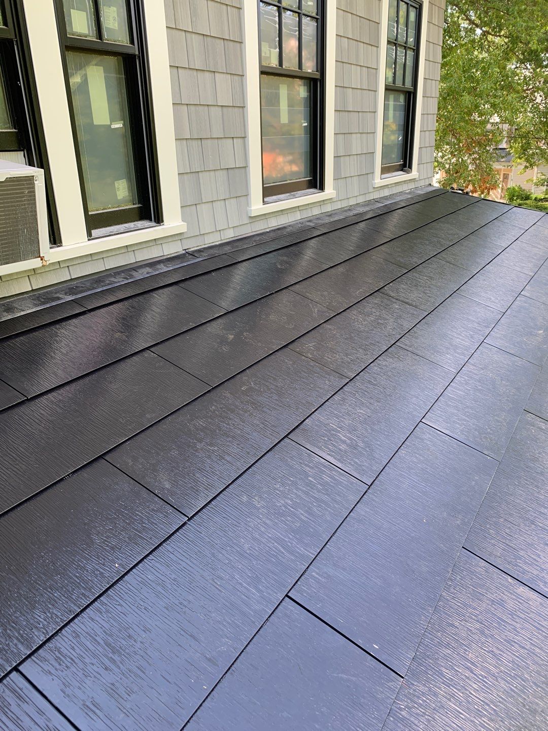 Tesla Solar Roof with Powerwall Storage by American Home Contractors