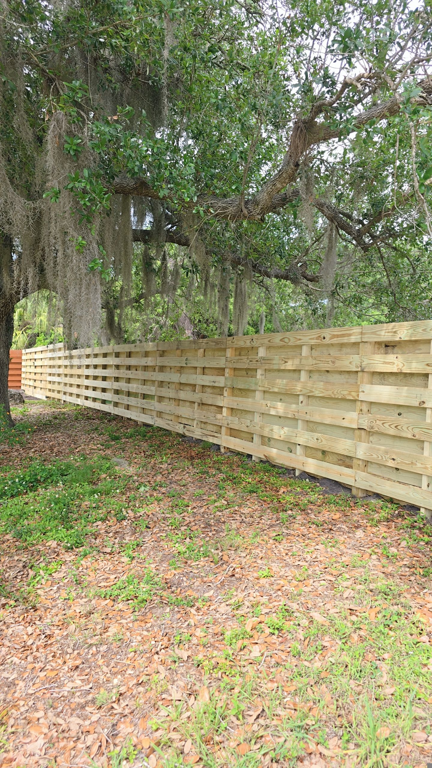 Horizontal Shadowbox Fence in Port Charlotte by True Fence LLC