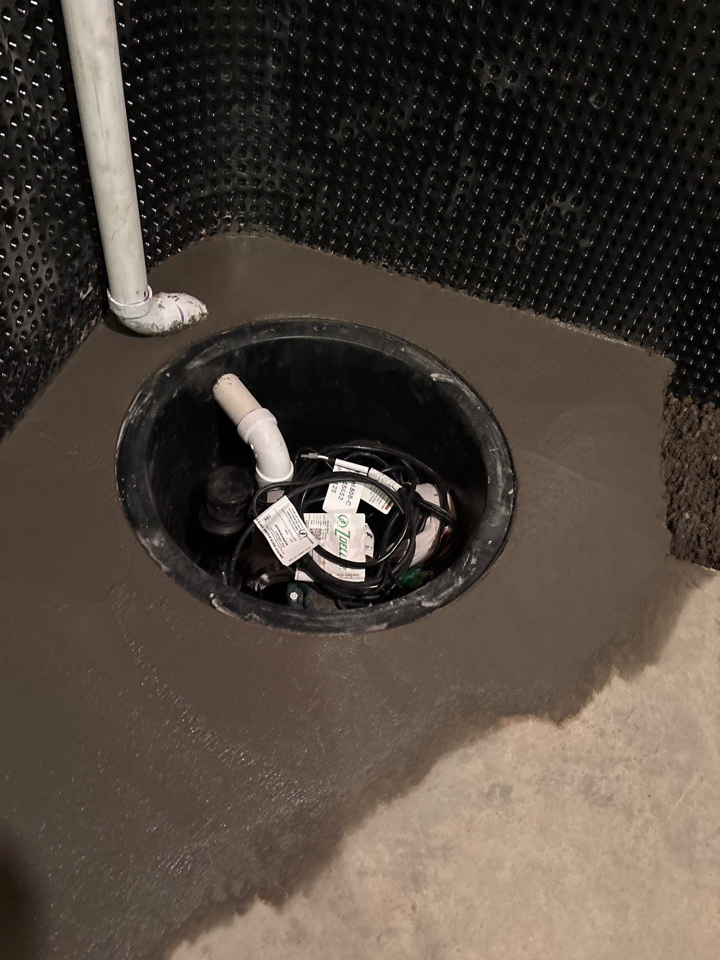 Interior Drain Tile & Buried Discharge in South Minneapolis by Waterproofing Northeast