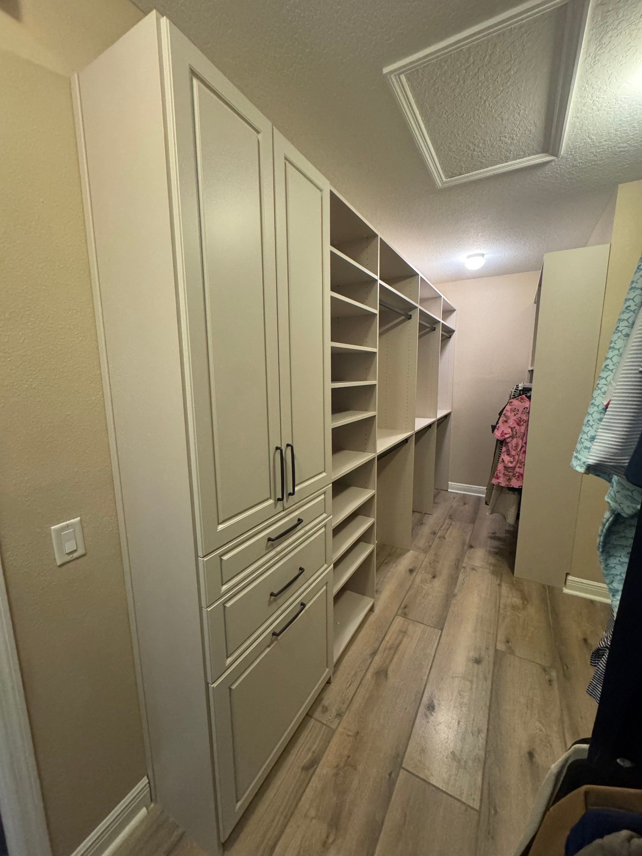Custom Closet Storage Systems and Laminate Cabinetry Installation in Oldsmar by Square 1 Garage and Closet Solutions