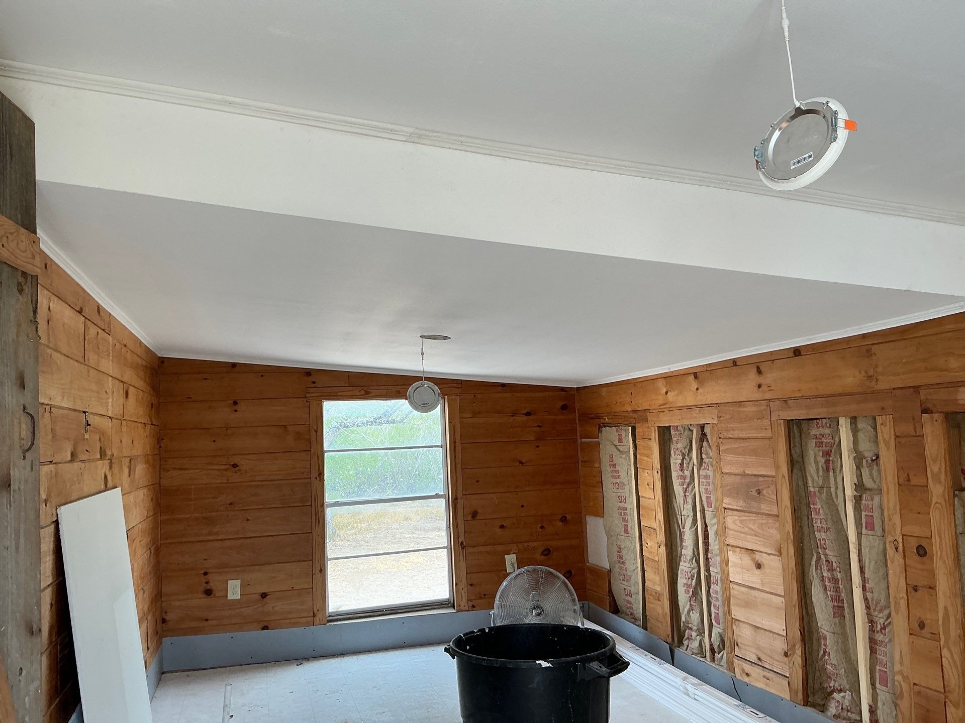 Paneling to Sheetrock Conversion by Very Good Construction Company