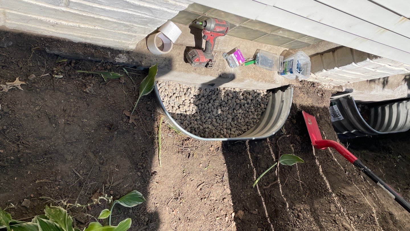 Drain Tile, Window Wells & Buried Discharge in Minneapolis by Waterproofing Northeast
