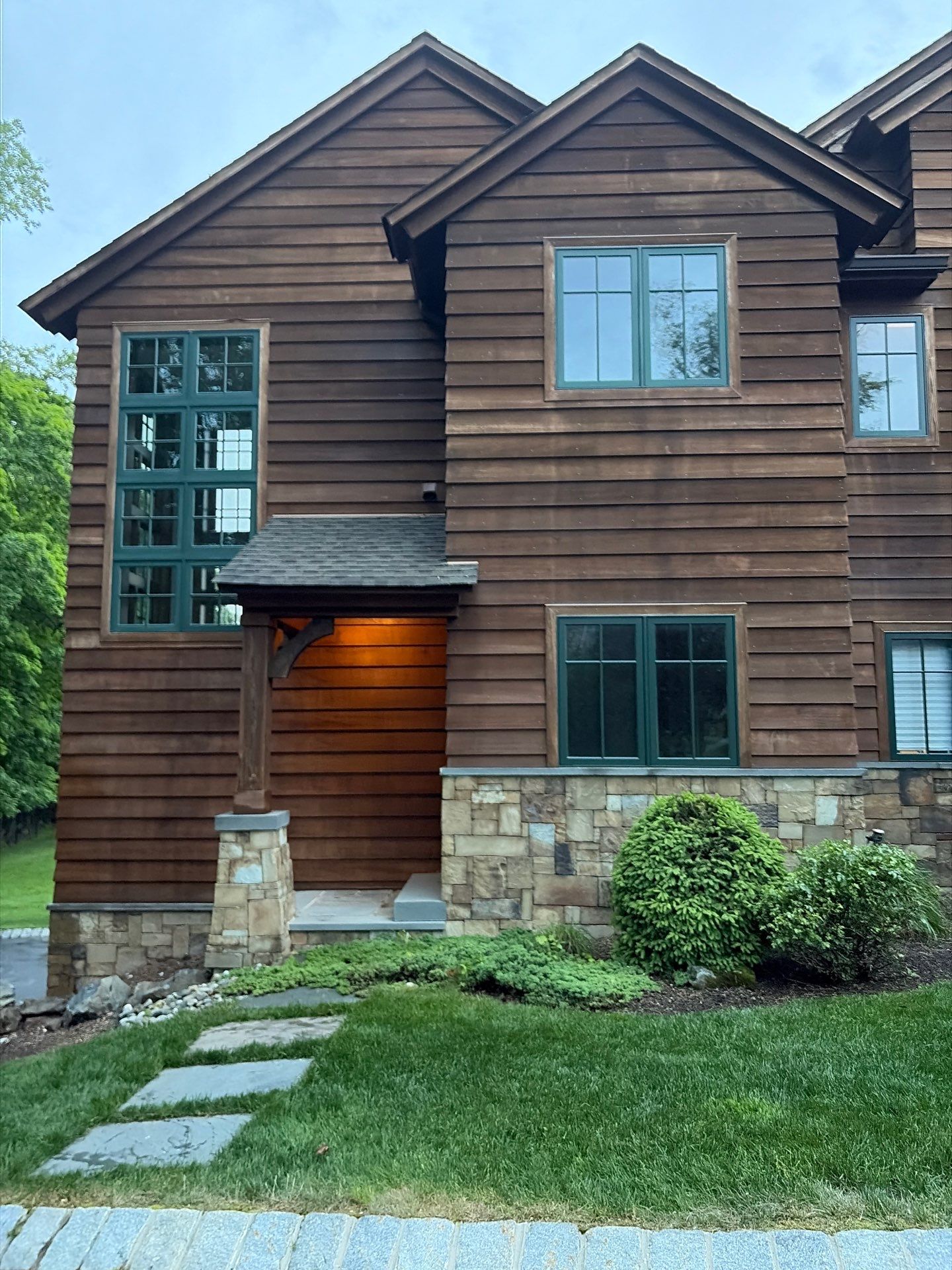 Exterior Powerwashing and Maintenance for a Teaneck Timber Home by Spectrum Painting, LLC