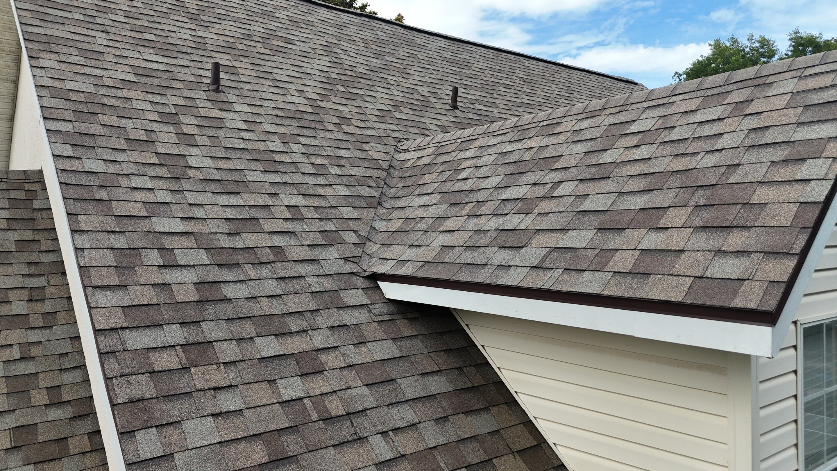 Full Residential Roofing Installation for Multi-Gabled Flagler Beach Home by Trinity Restoration and Roofing LLC