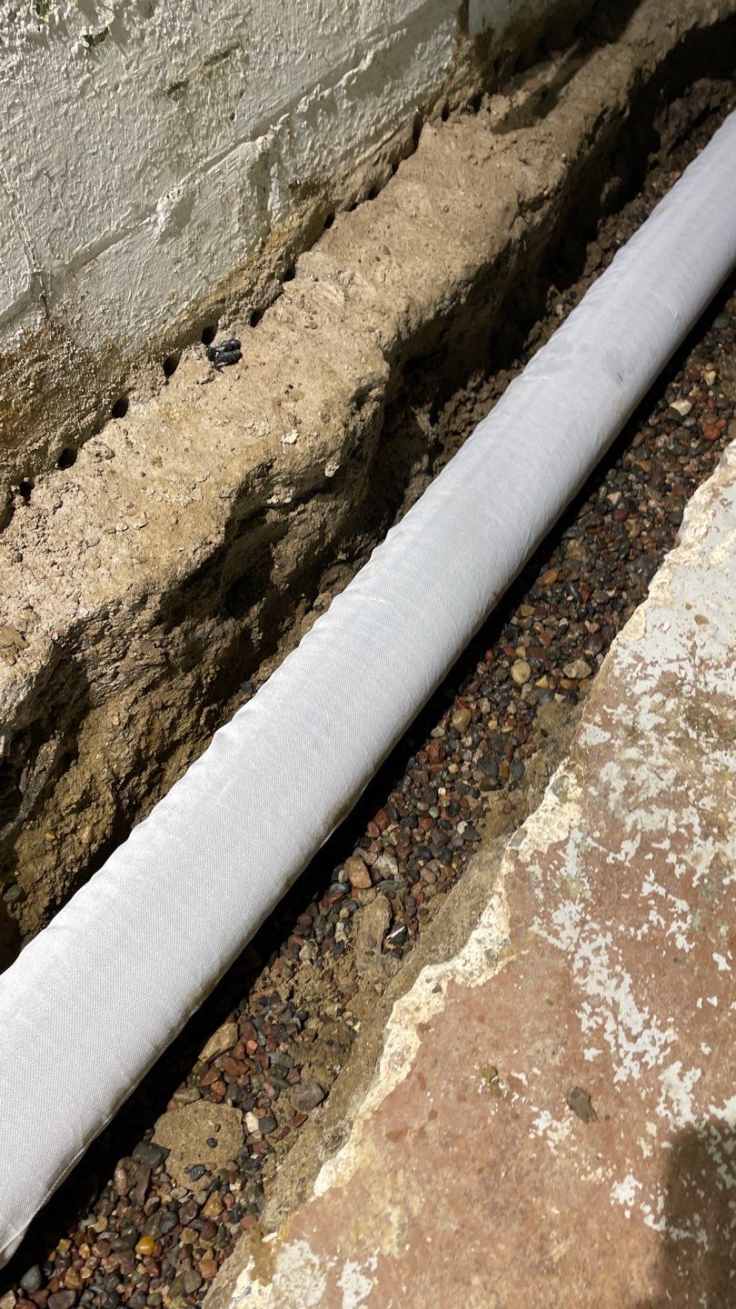 Basement Drain Tile & Sump Pump in Northeast Minneapolis by Waterproofing Northeast