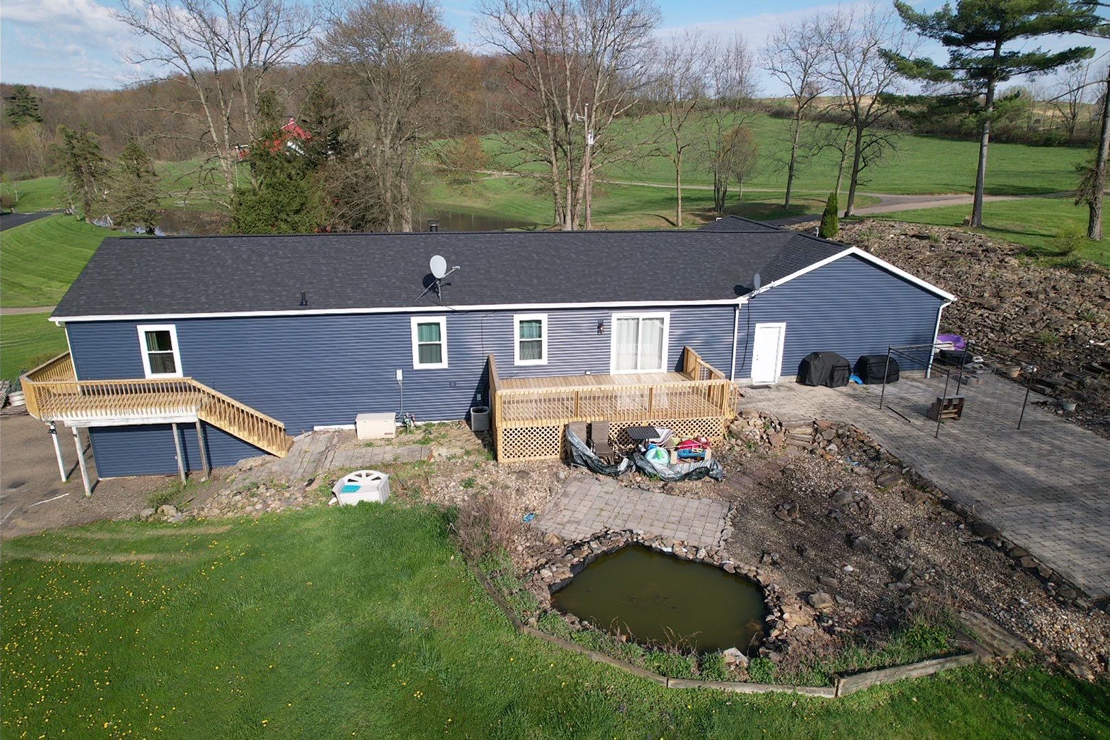 Dundee, Ohio Shingle Roof, Siding, Stone and Deck Installation by Pine Ridge Roofing LLC
