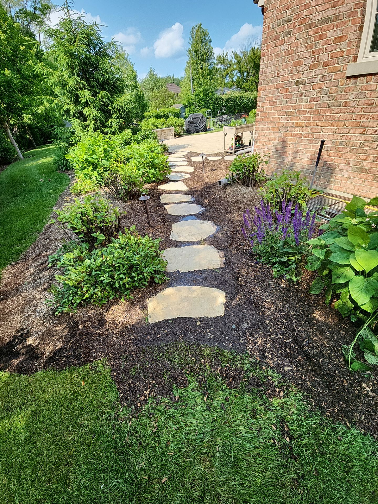 Brick paver repair, cleaning sanding and sealing by Northern Power Washing LLC.