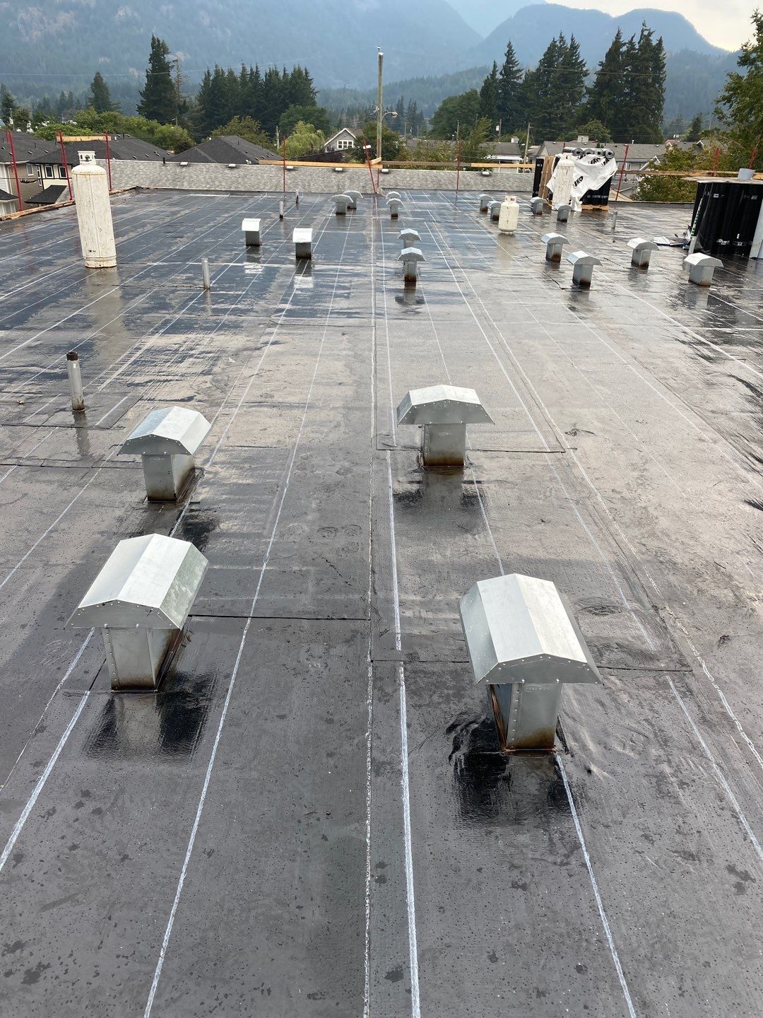 Residential ReRoofing Installation using IKO 2ply sbs  by Top Notch Roofing Inc