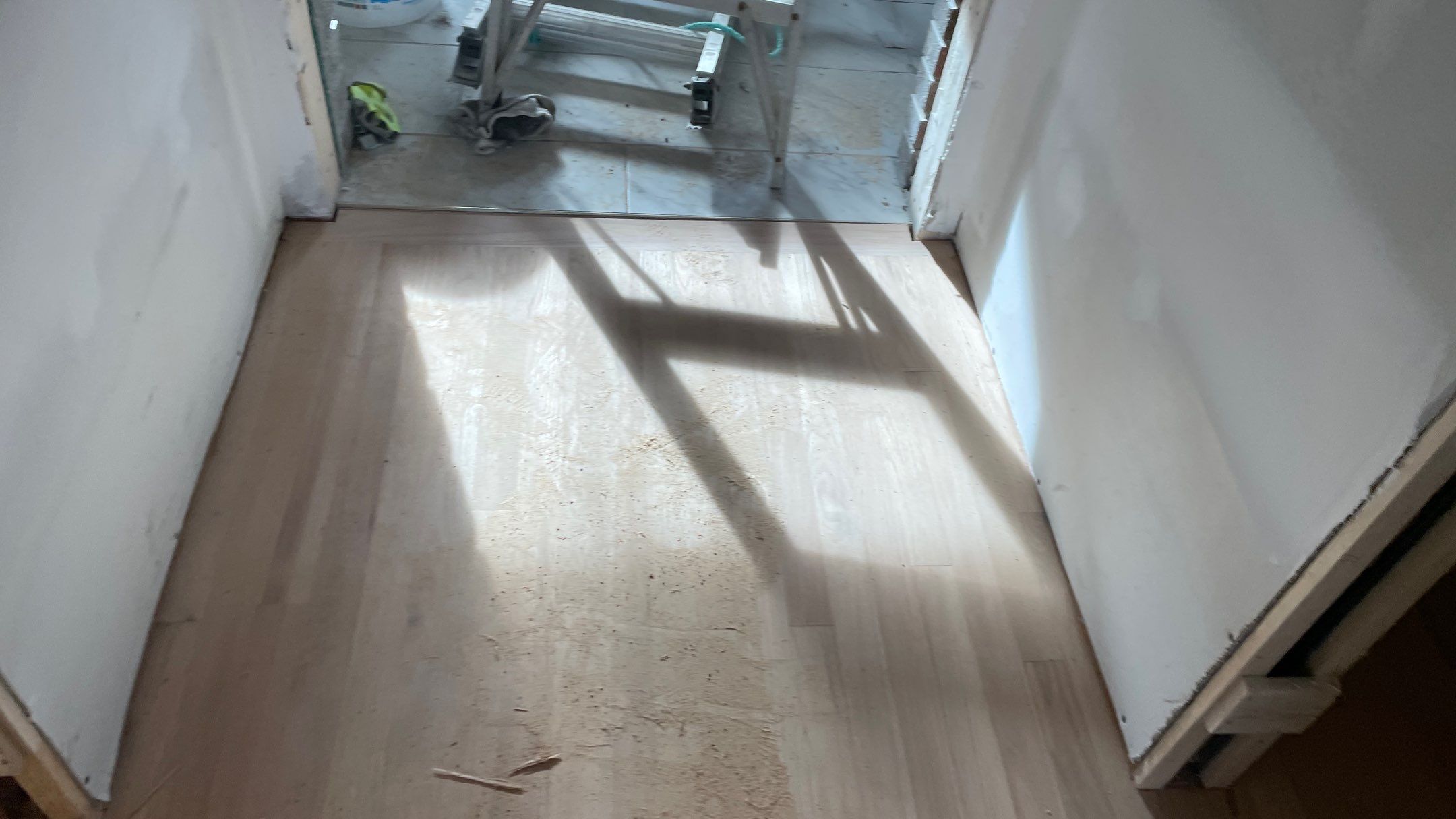 Remodeled Home with new tile floors, Showers and Refinished Oak Floors with stain and Waterbased Finish by Footprints Floors of Coastal Carolina