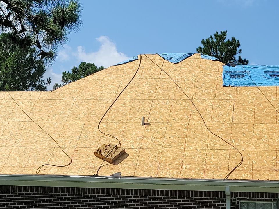 Residential Roofing Installation using Roof Replacement by American Roofing & Construction LLC