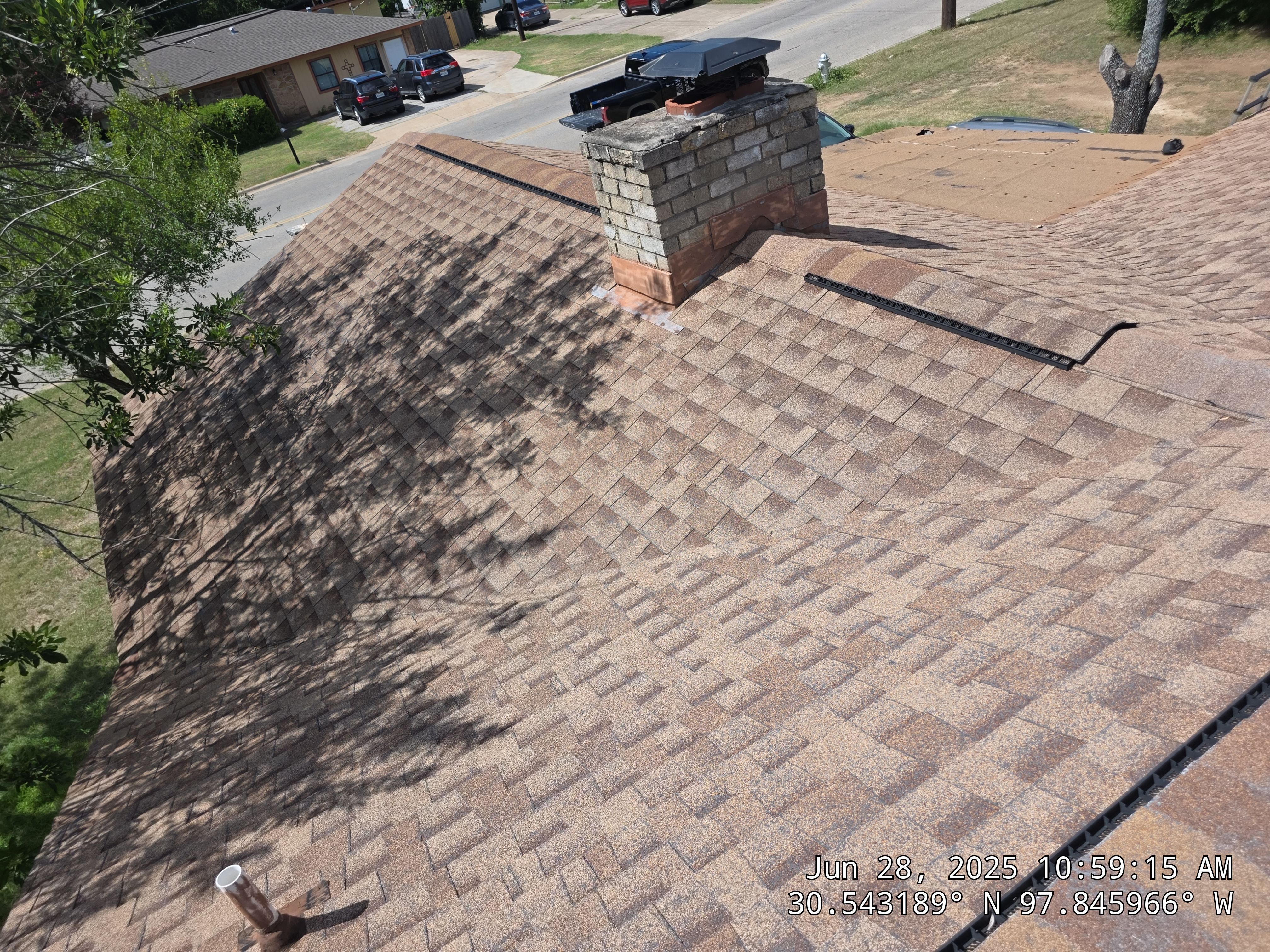 Architectural Asphalt Shingle Roof Replacement and Chimney Repair in Leander by Caliber Restoration LLC