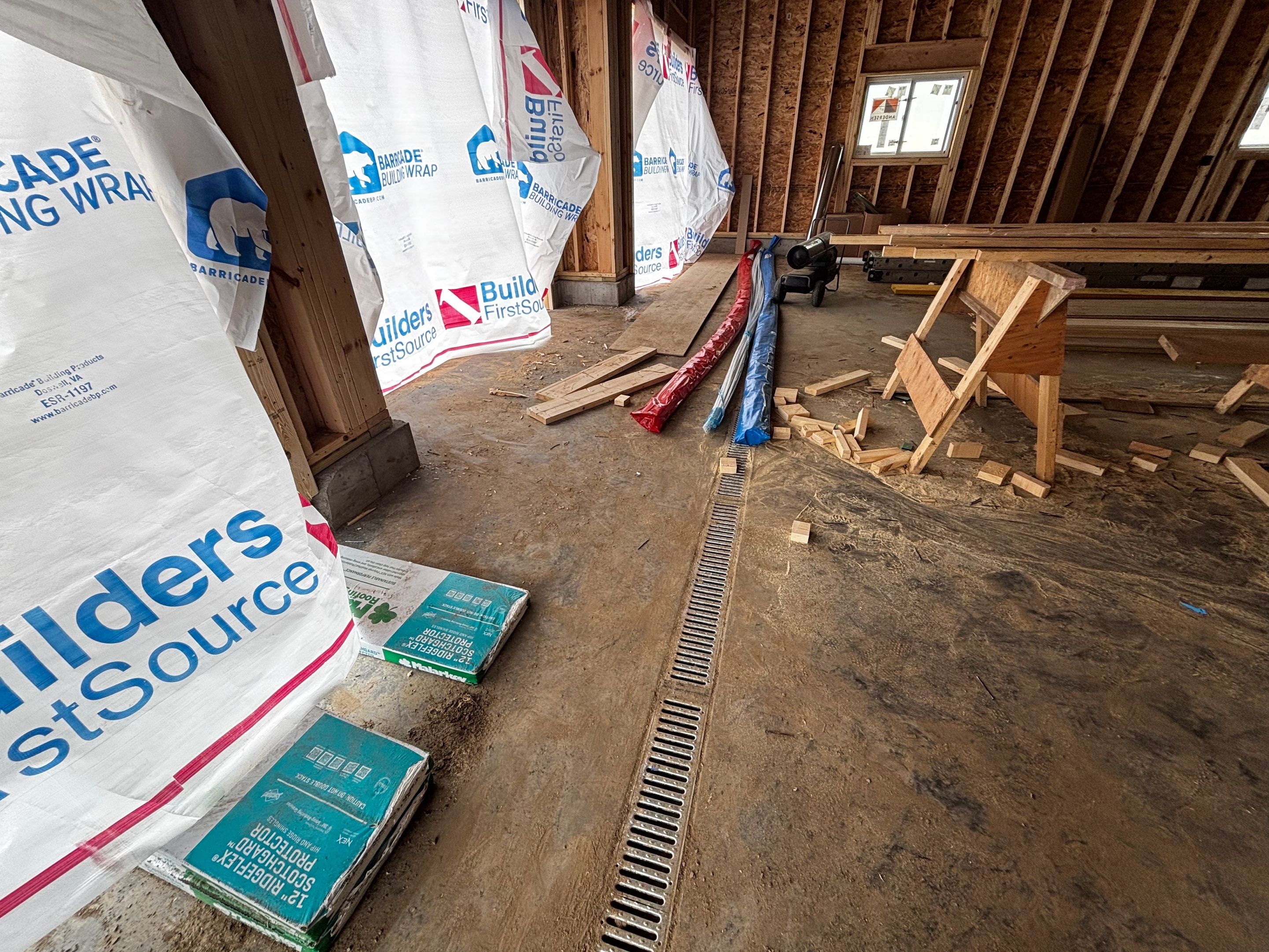 Multi-Car Garage Epoxy Floor Coating and Concrete Finishing in Sioux Falls by Select Painting, Coatings & Garage Cabinets