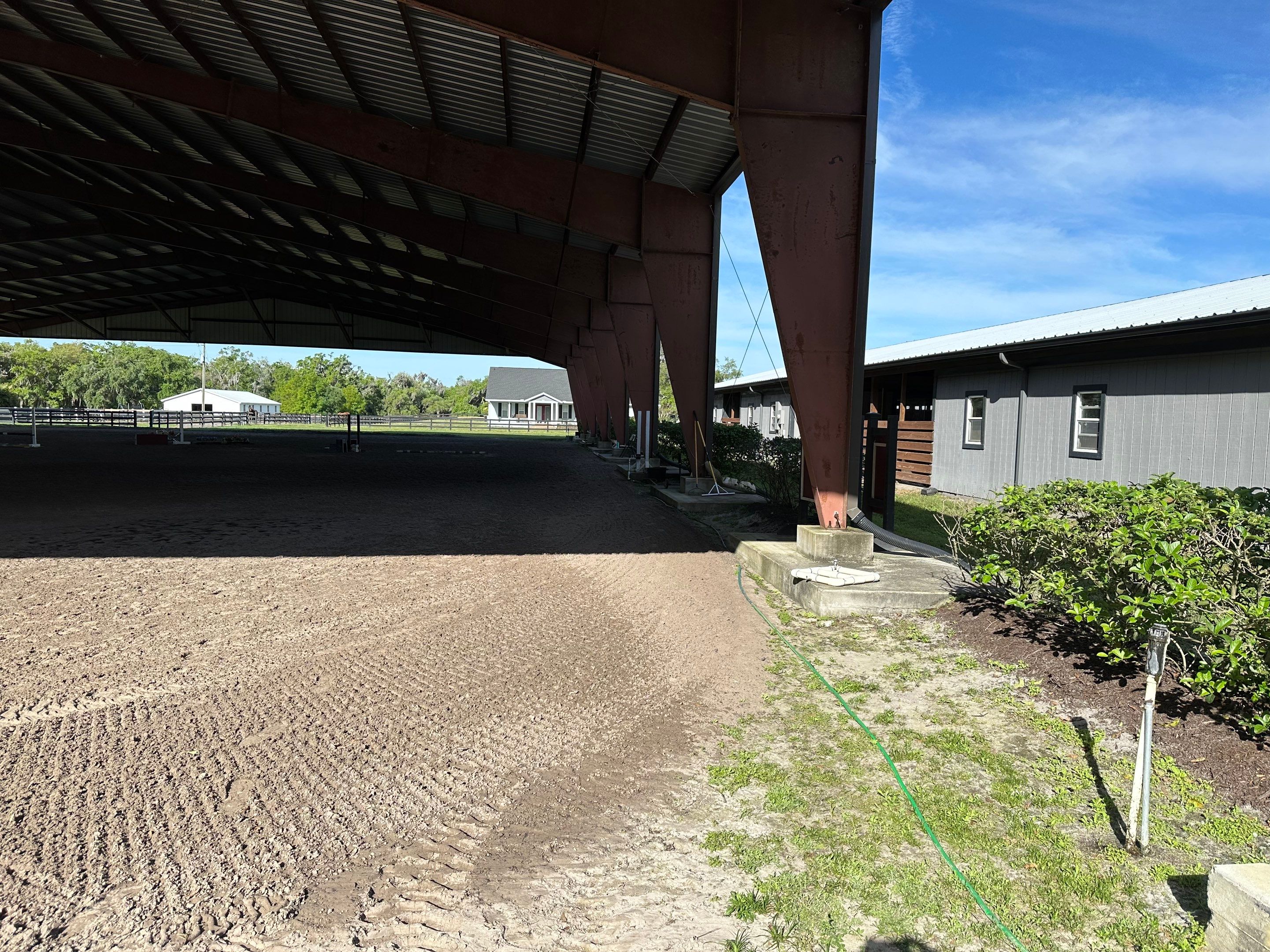 Vinyl Horse Fence & Concrete Pier Cleaning at Lesley Cox Equestrian, Parrish, FL | Sunshine AquaWash by Sunshine AquaWash