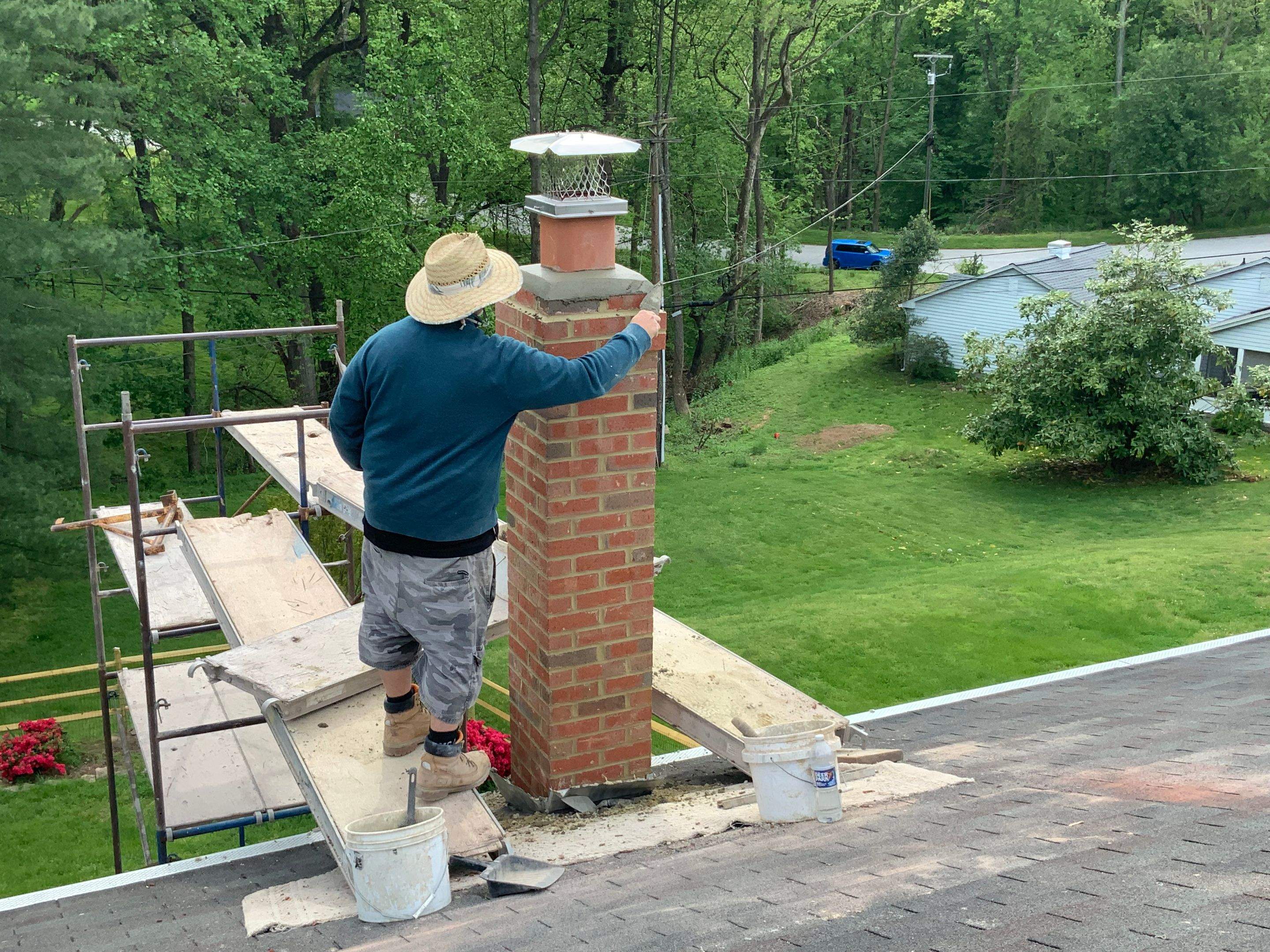 Residential Roofing Installation using Landmark Shingles Color Weatherwood by Alpha Design Services
