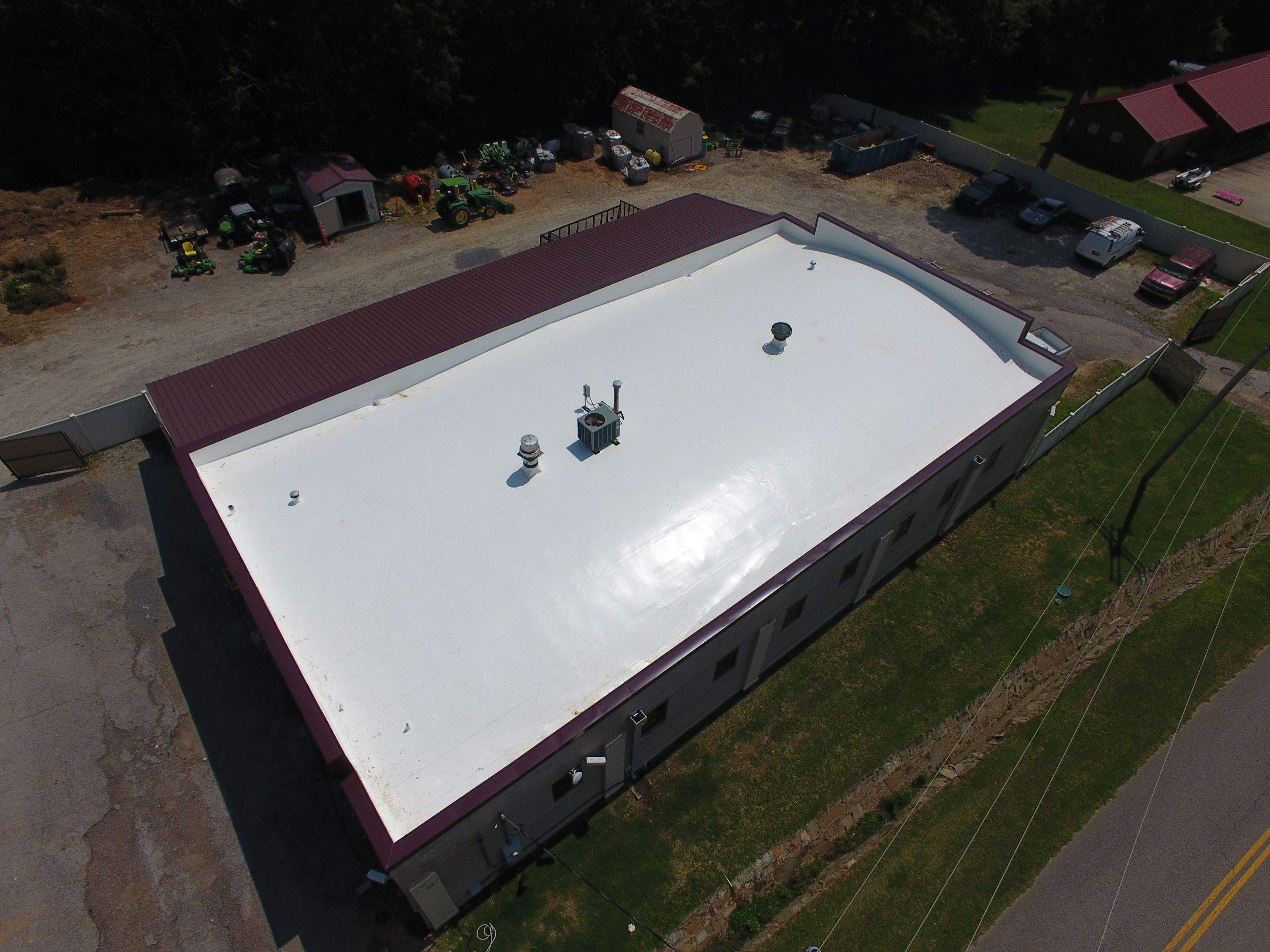 Choctaw Nation Healthcare Center - White Building by Hostetler Roofing