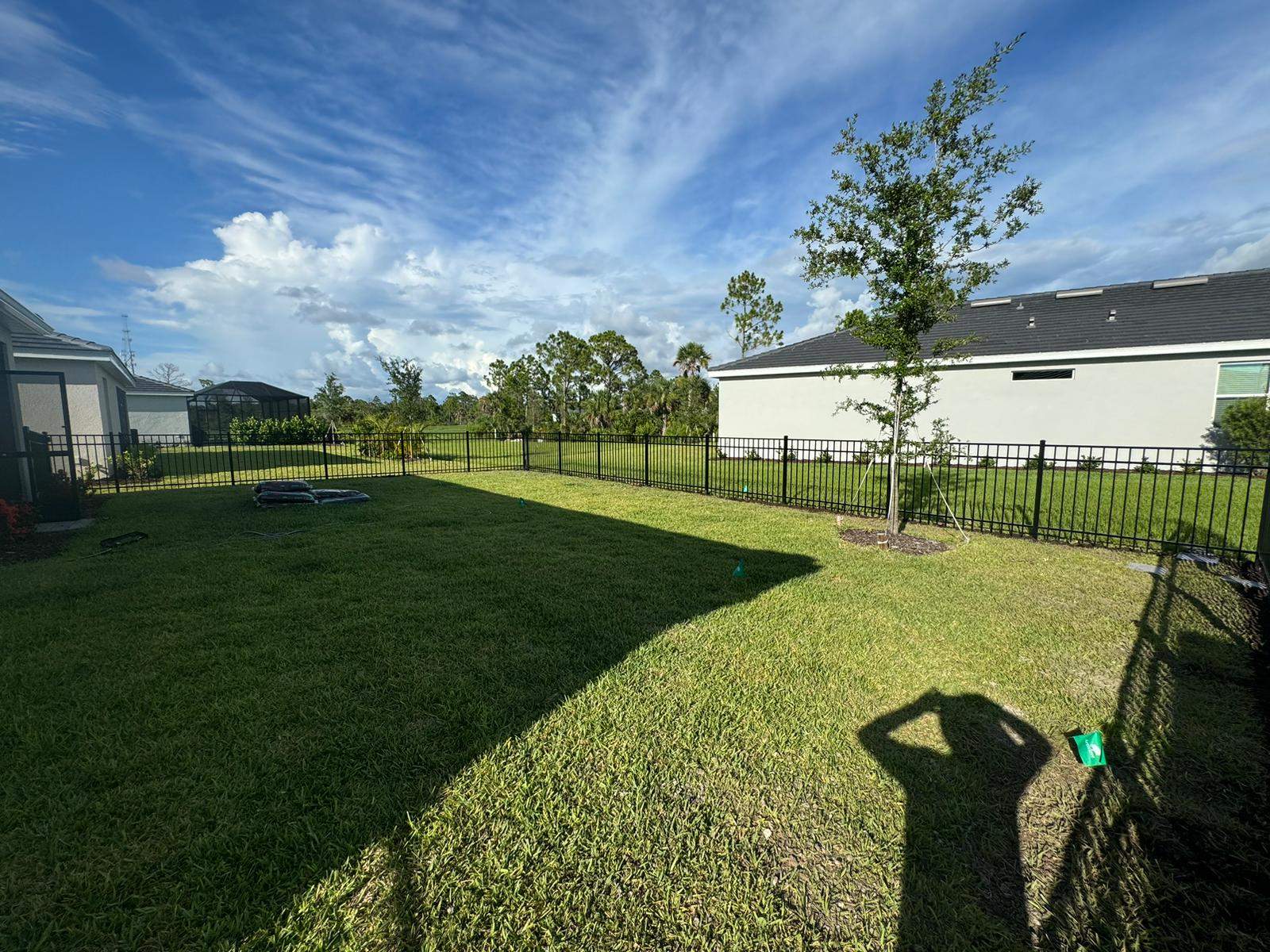 Black Aluminum Picket Fence Installation in Venice, Florida by True Fence LLC