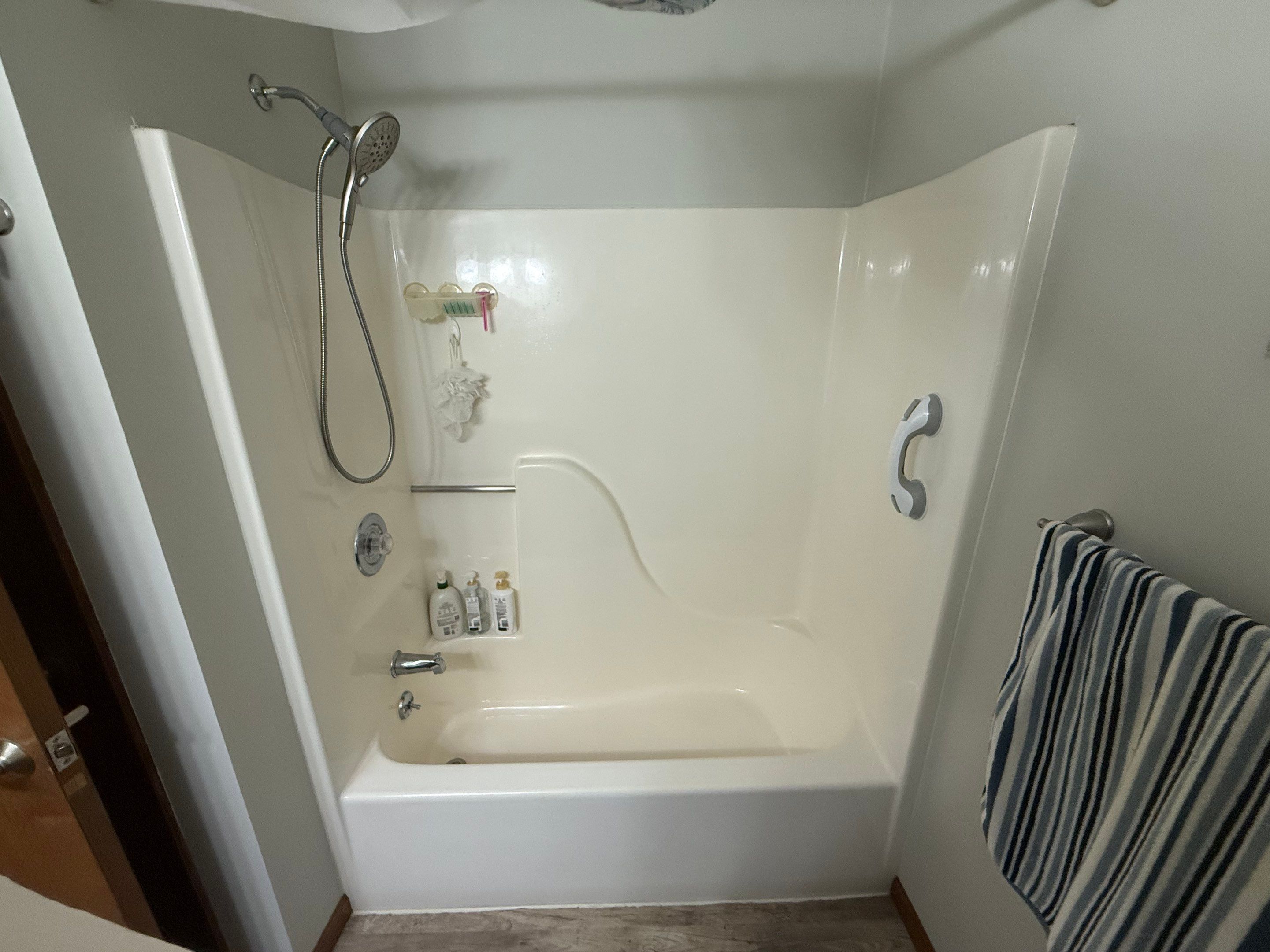 Jacuzzi Walk-In Shower Conversion Featuring Marble Acrylic Walls in Gaylord by Rainbow Seamless Systems