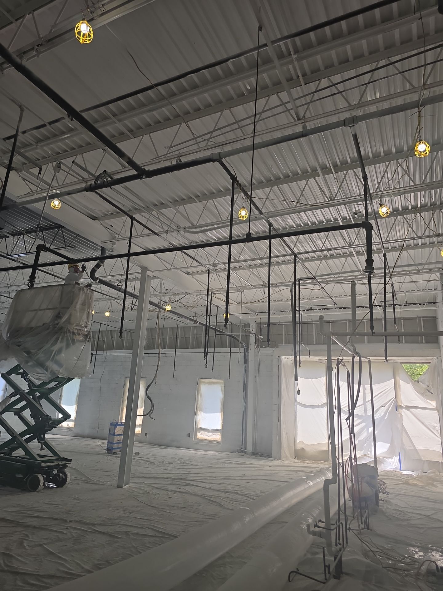 Industrial Warehouse Fire Damage Cleaning and Spray Sealing in Islandia by EMS Restoration Corp