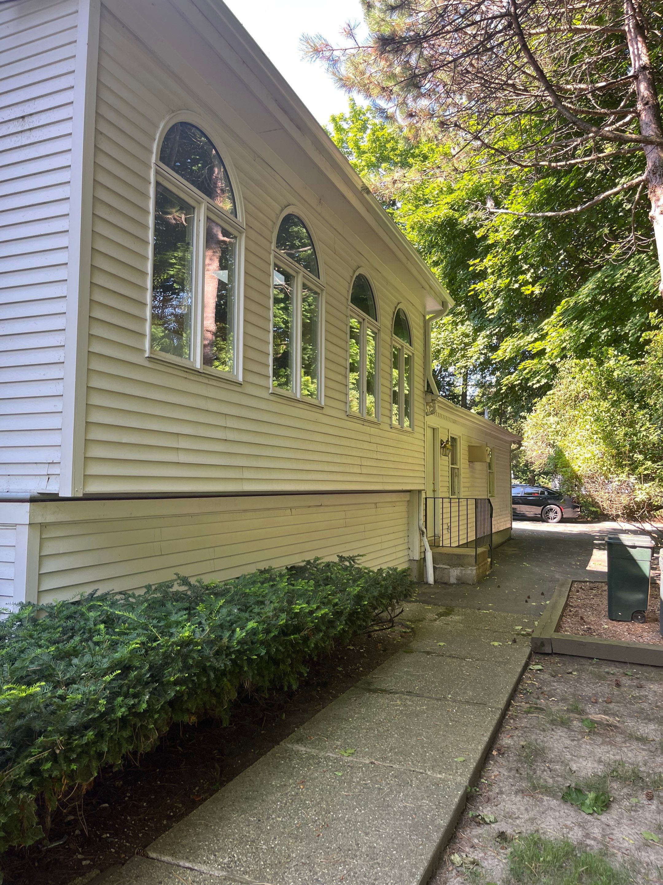 Housewashing  using Algaecide, soft wash soap by Northern Power Washing LLC.