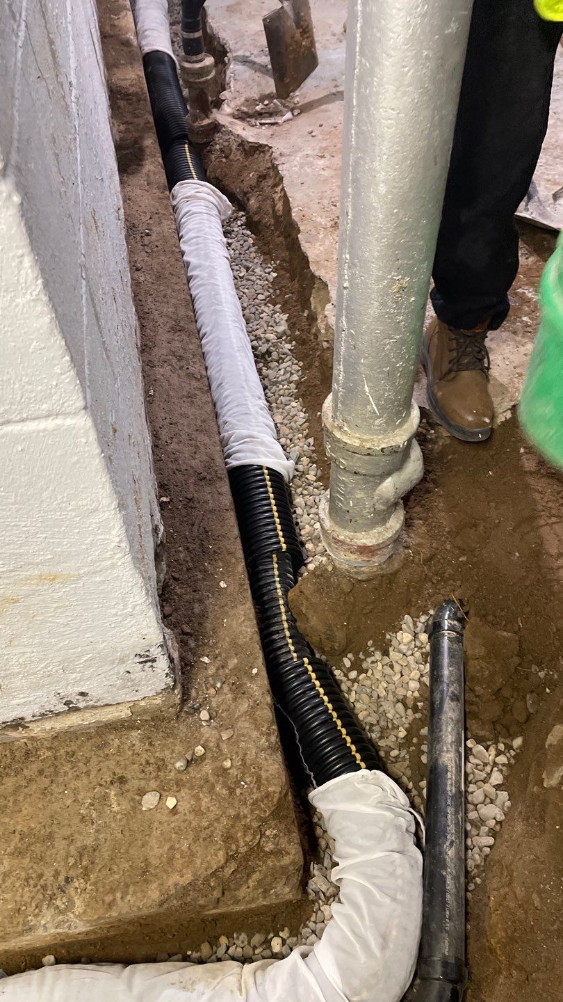 Interior Drain Tile & Yard French Drain in St. Paul, MN by Waterproofing Northeast