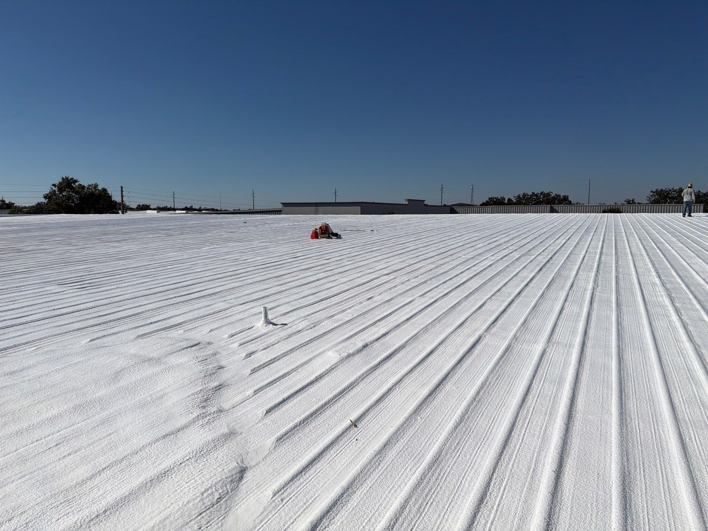 Orlando Commercial Metal Roof Restoration and Silicone Coating System by CES Roofing