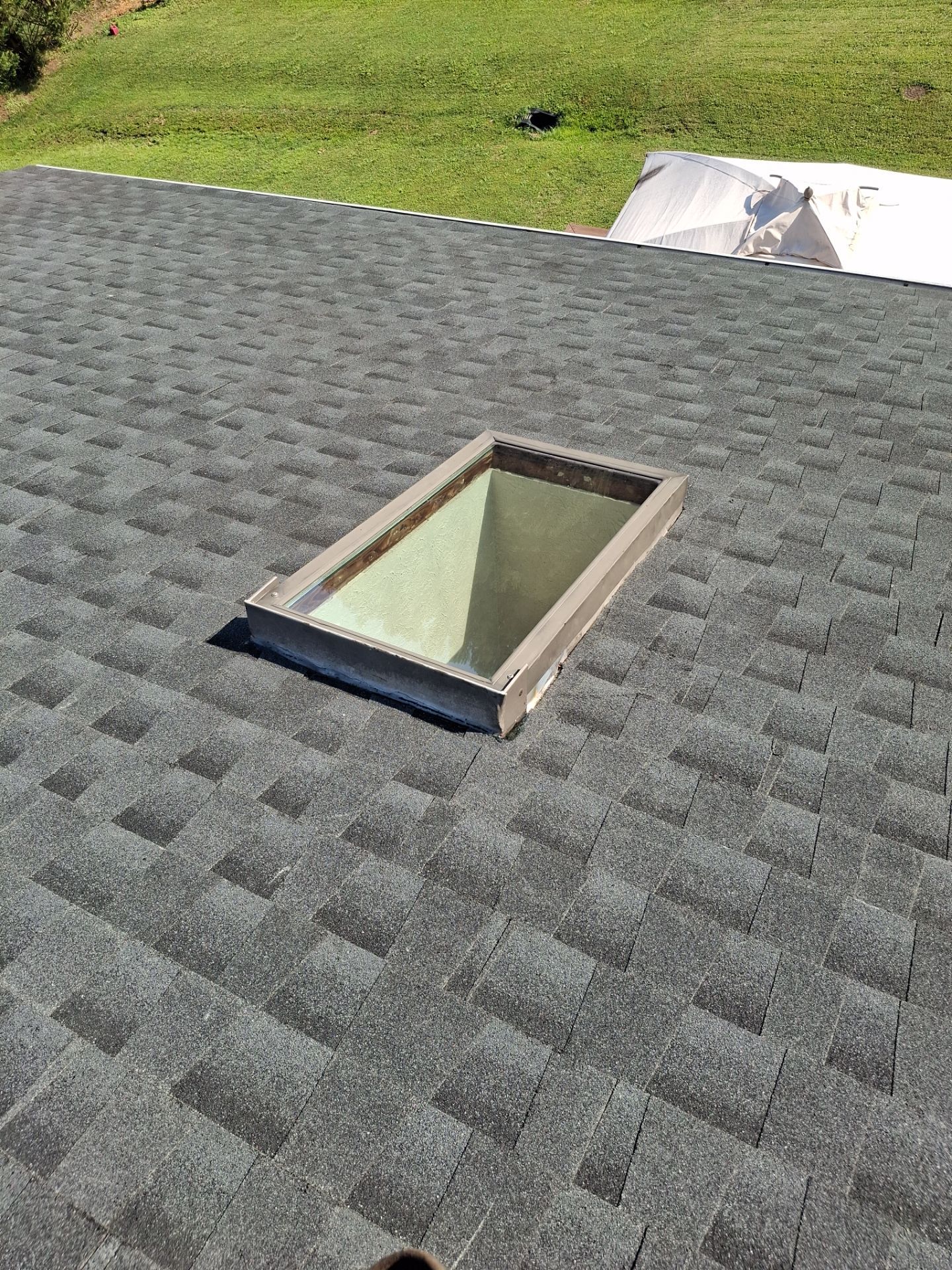 Residential Roofing Installation using GAF Timberline HDZ Charcoal by Rainstoppers Roofing