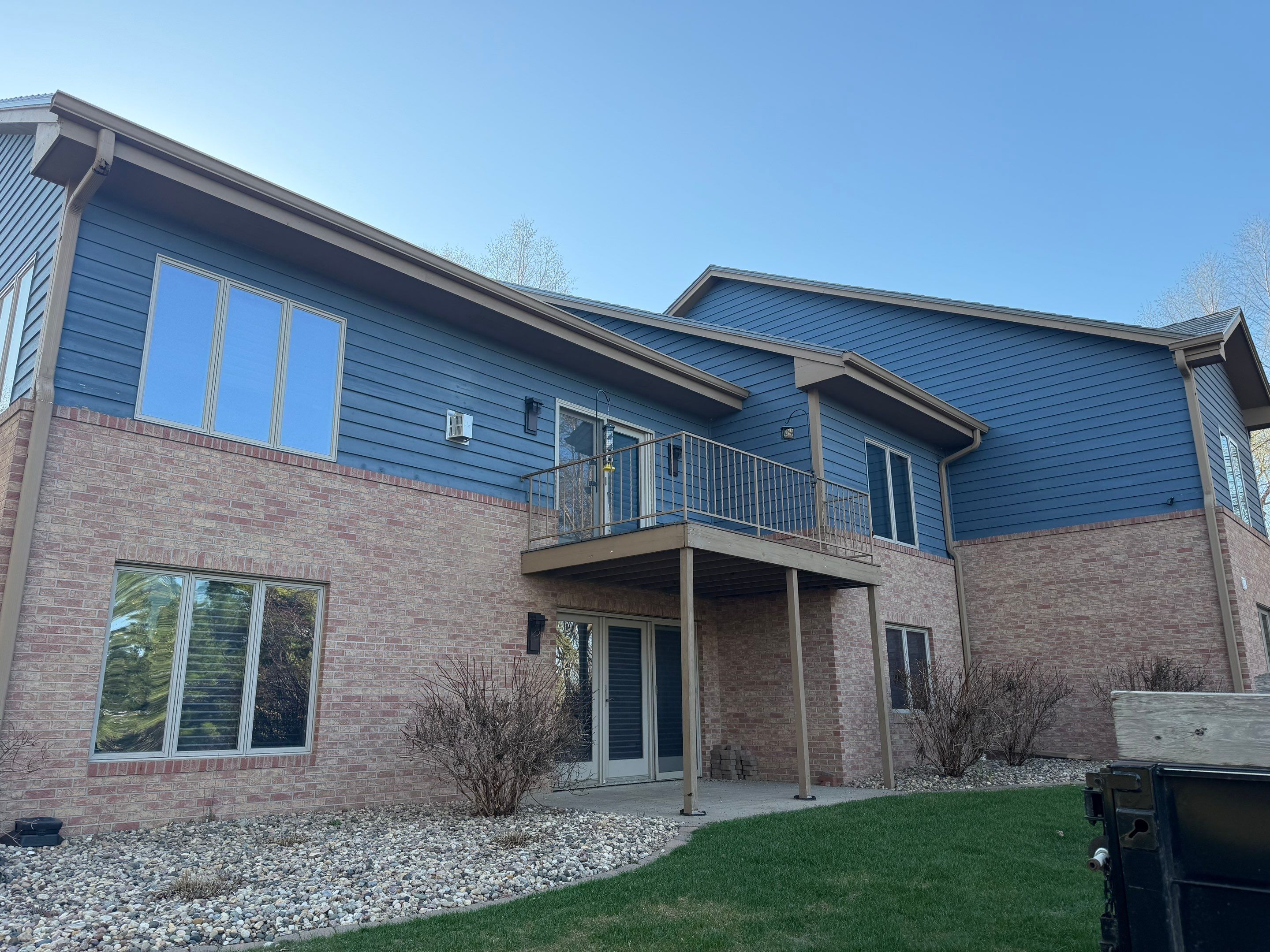 Residential Exterior Painting and Siding Refresh in Sioux Falls by Select Painting, Coatings & Garage Cabinets