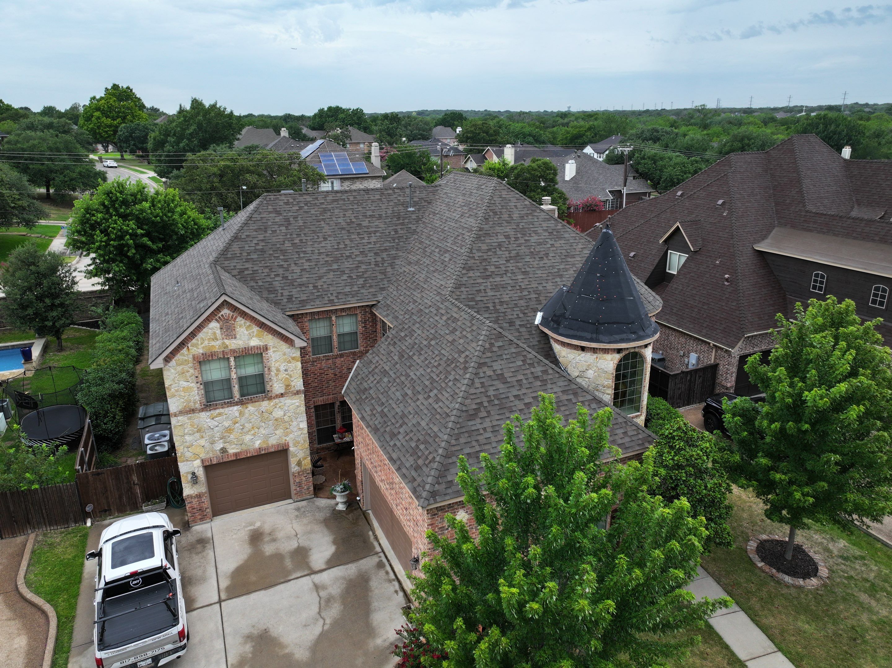 Installing Custom copper turret and Malarkey Vista Class 4 shingles Hail Damage Upgrade by Becker Roofing and Exteriors