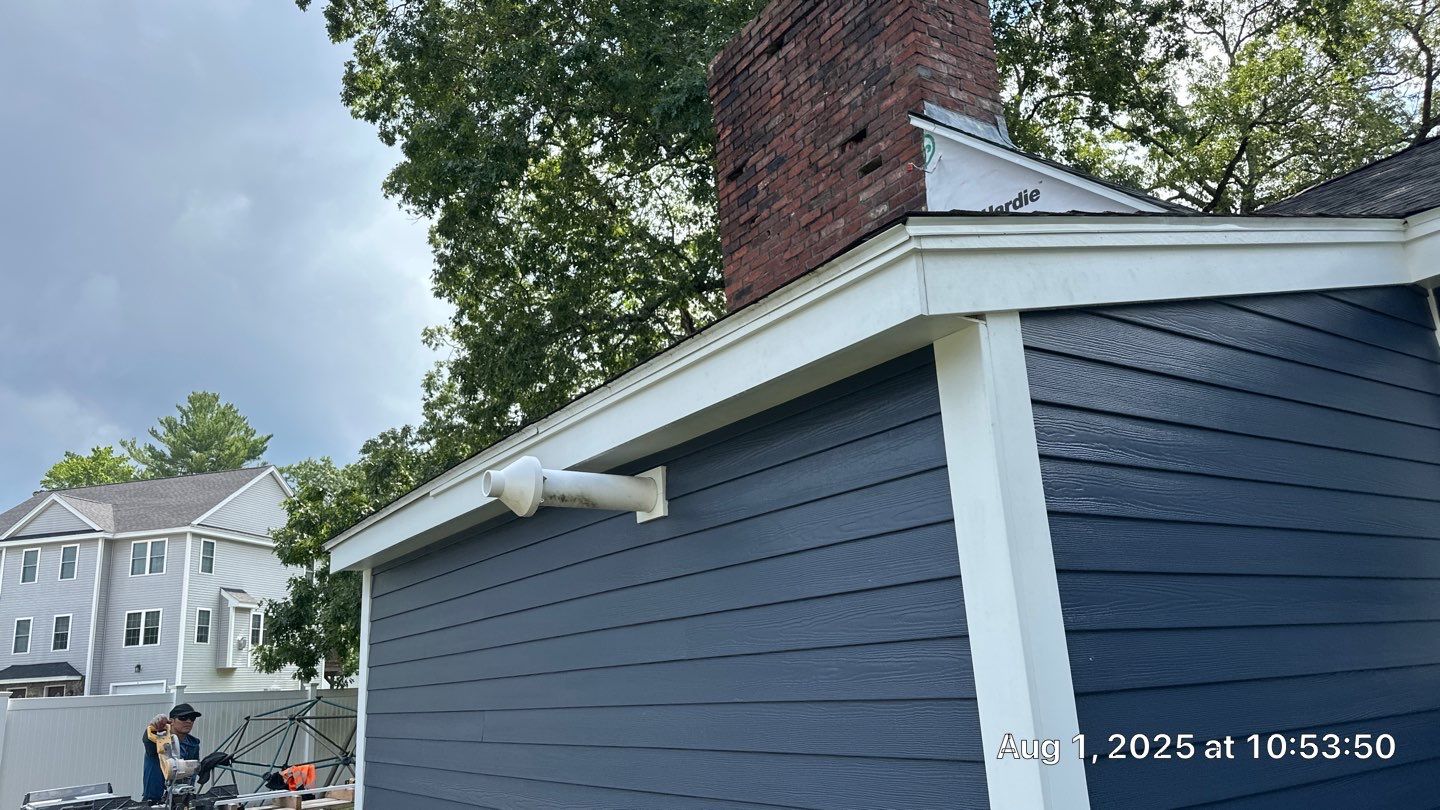 James Hardie Lap Siding Installation in Chelmsford, MA by Mighty Dog Roofing of Greater Middlesex County