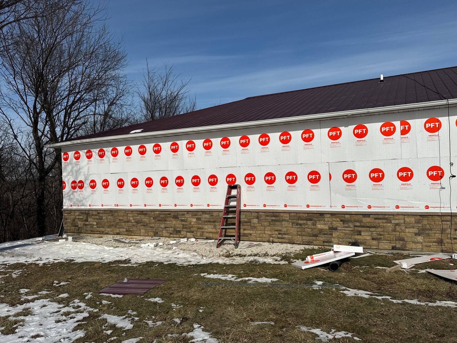 Siding and Stone Installation using Extrerior Porfolio Vinyl Siding and Versetta Stone by EEC  Windows, Siding & Roofing 