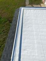 Roof Installation using Silicone TPO by ExteriorPros