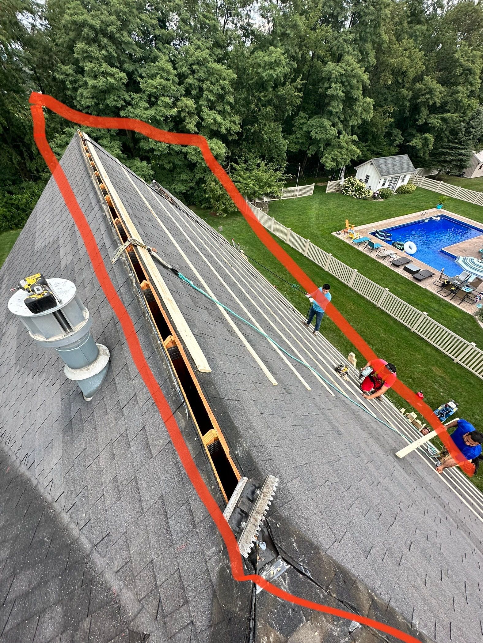 Standing seam / Azm panel in black  by Teflon Roofing