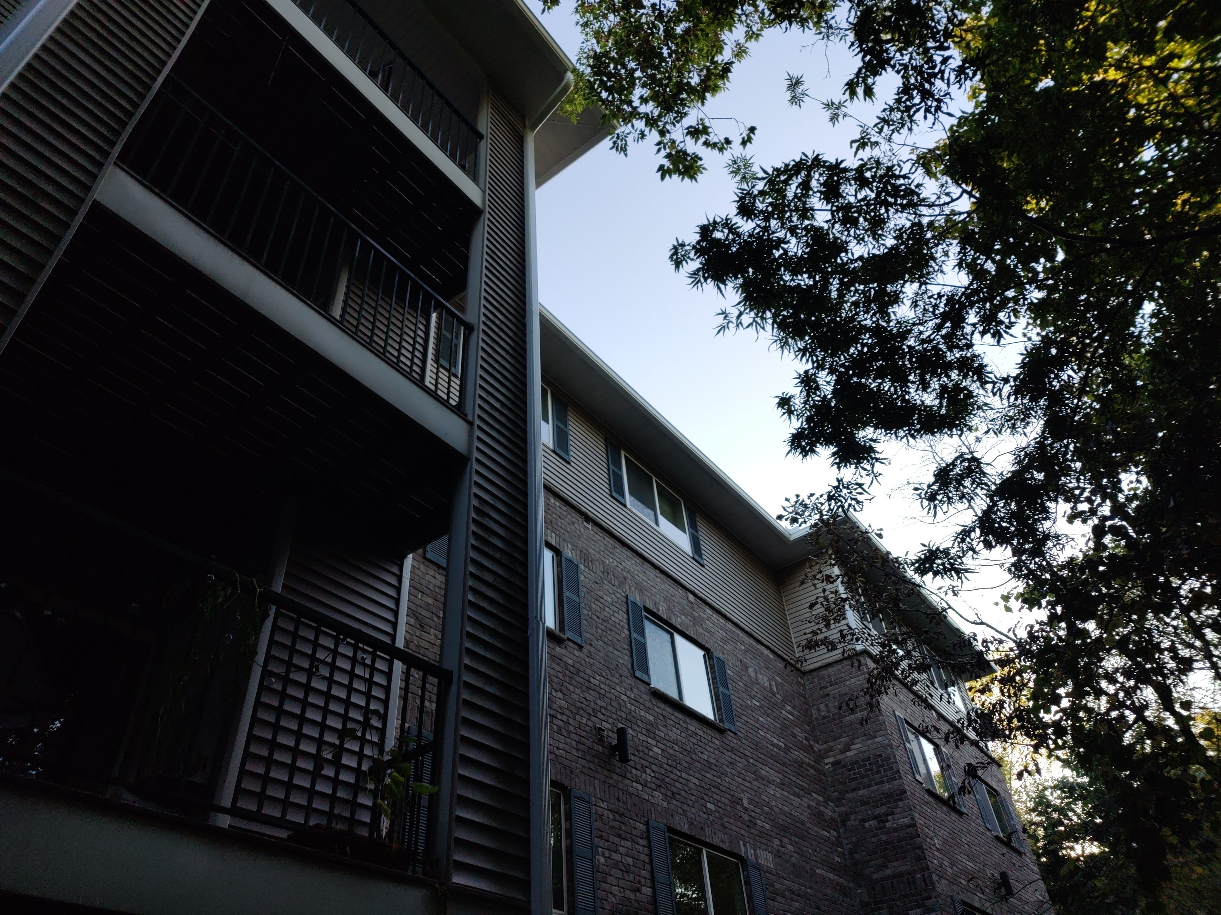 6" White Seamless gutters on Apartment Building- Prior Lake, MN by Next Level Seamless Gutters / Exteriors Inc.