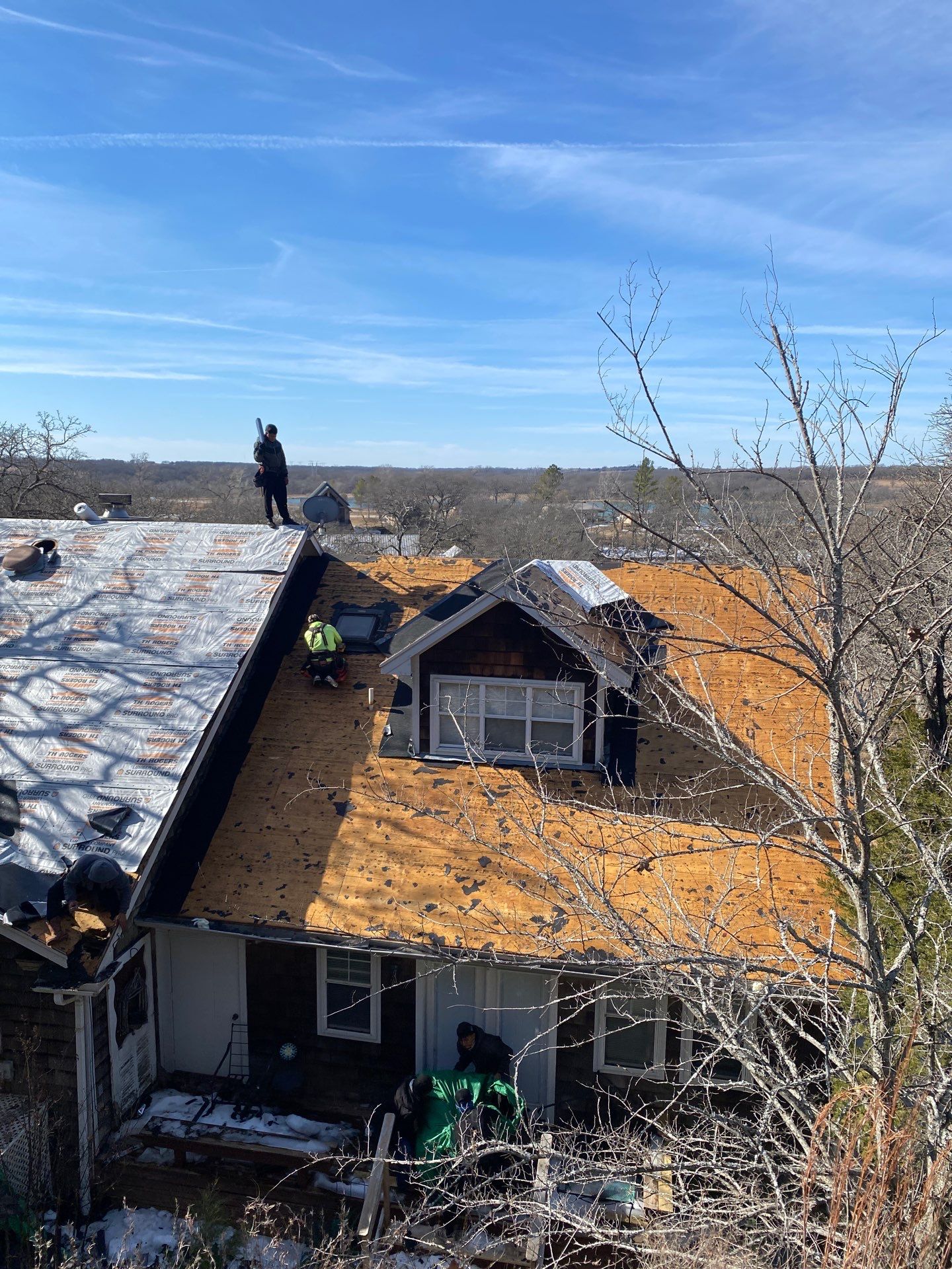 Roof Replacement on a private lake near Ardmore by BANA Roofing and Solar Supply