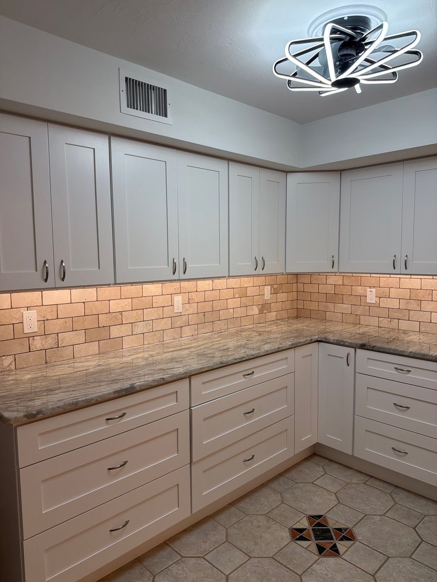 Completely Re-imagined Modern Condominium Kitchen Remodel  by Acies Renovations