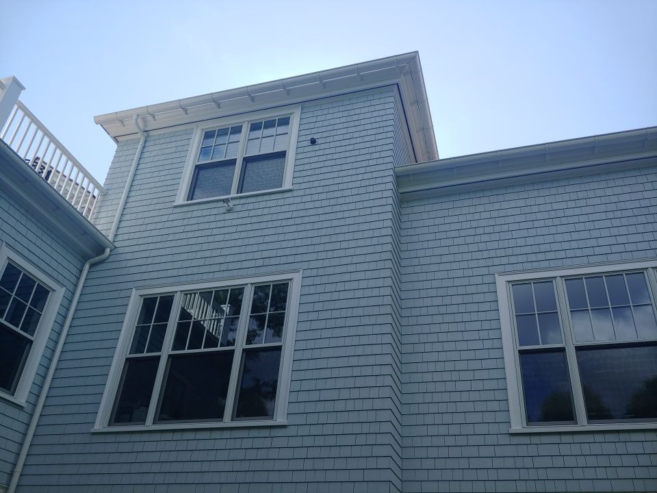 Gutter Installation using 6" Half Round Aluminum Gutter over Crown Moulding by Gutter Pro Enterprises