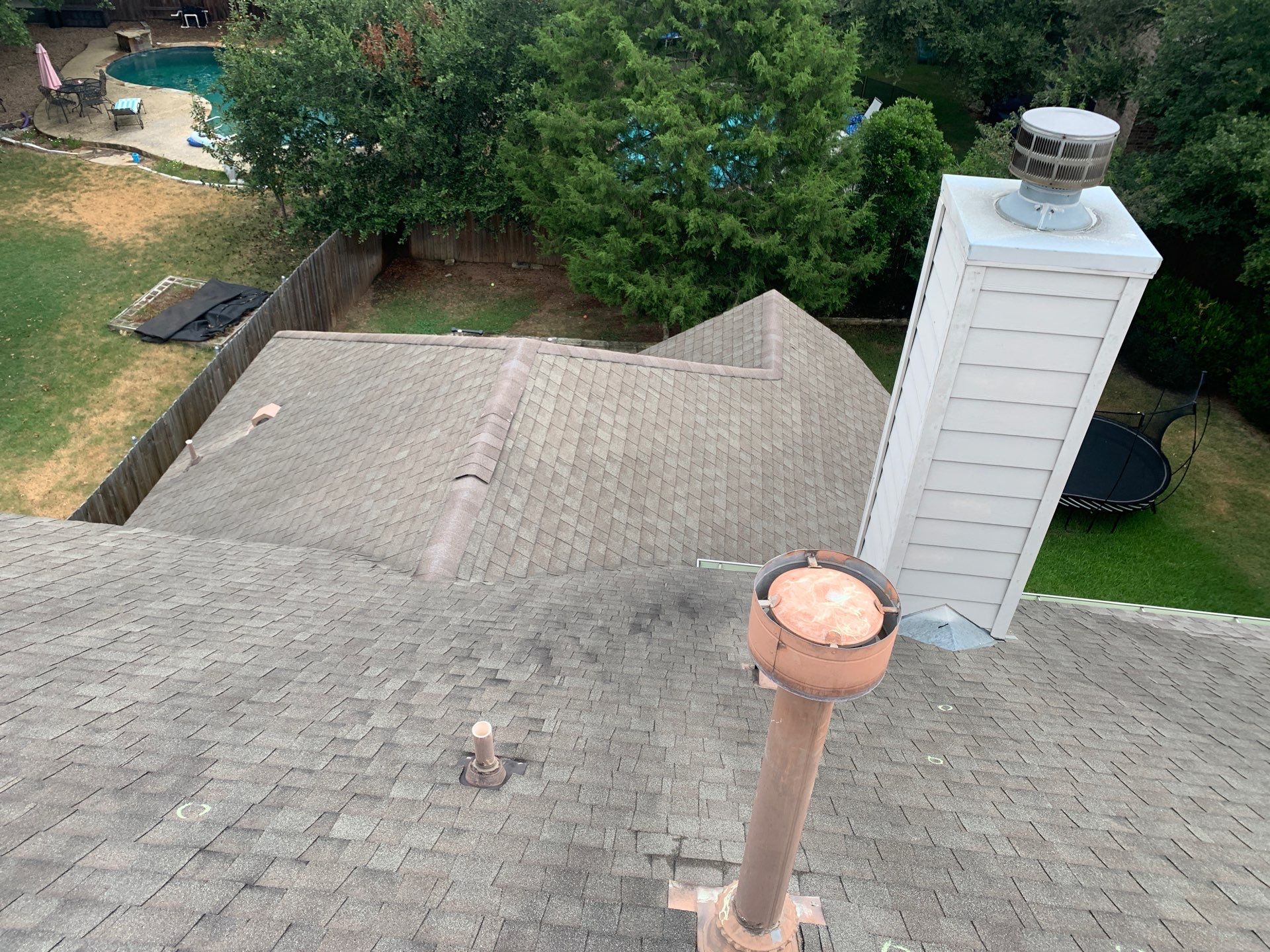 Hail Damage Restoration and Asphalt Shingle Roof Replacement in Austin by Caliber Restoration LLC