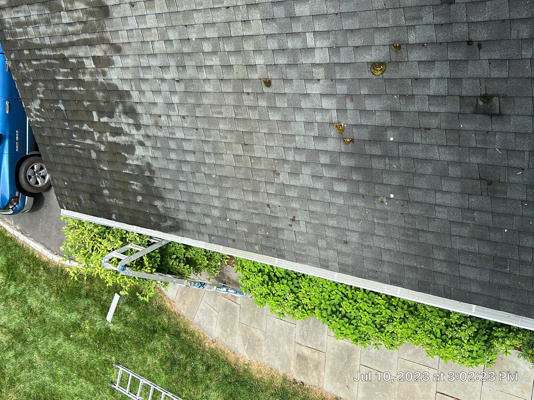 Gutter Installation using White gutters and roof clean up by A Plus Exterior